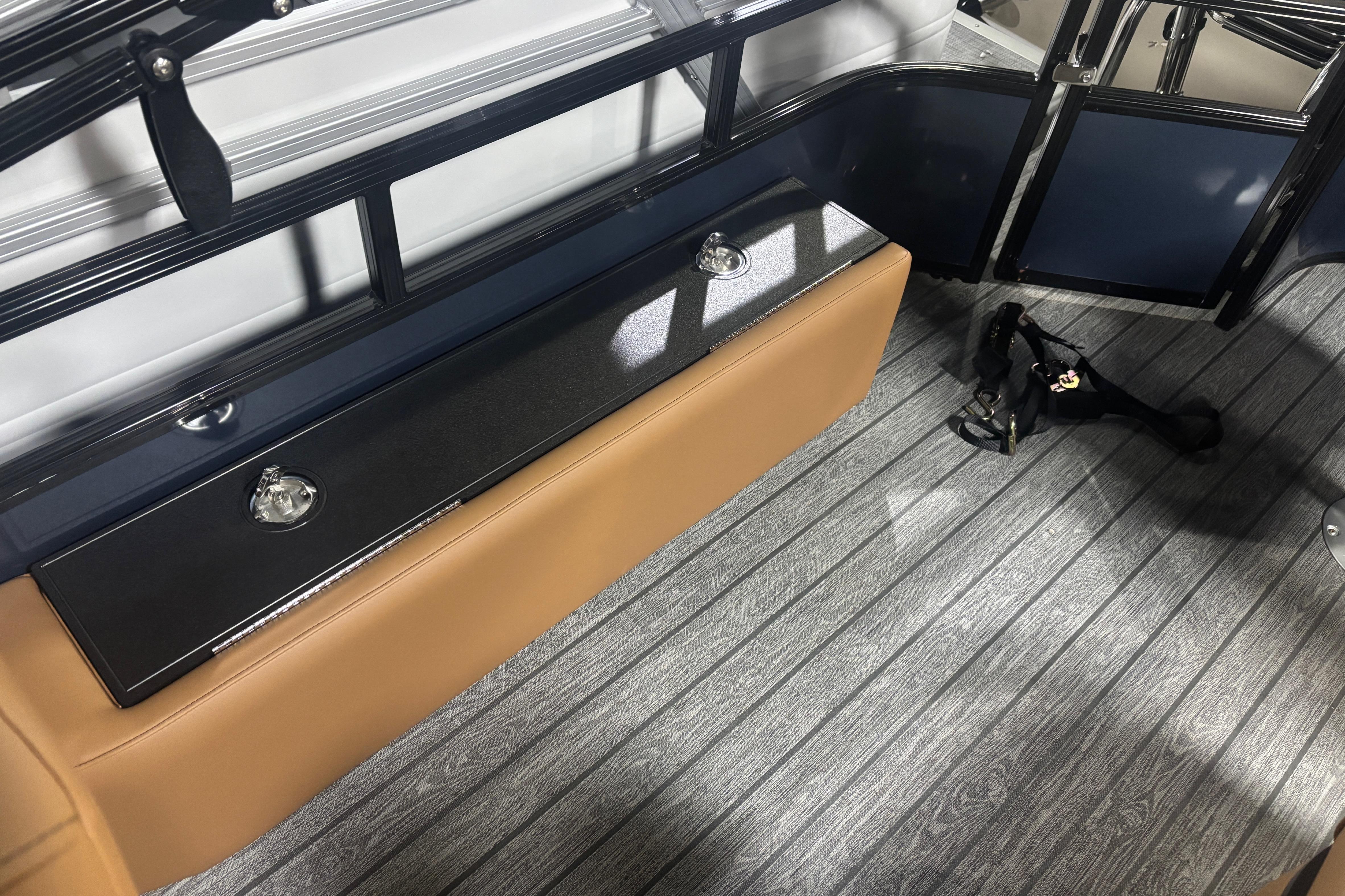 Interior of 2026 Ranger 223F boat with seating and flooring details.