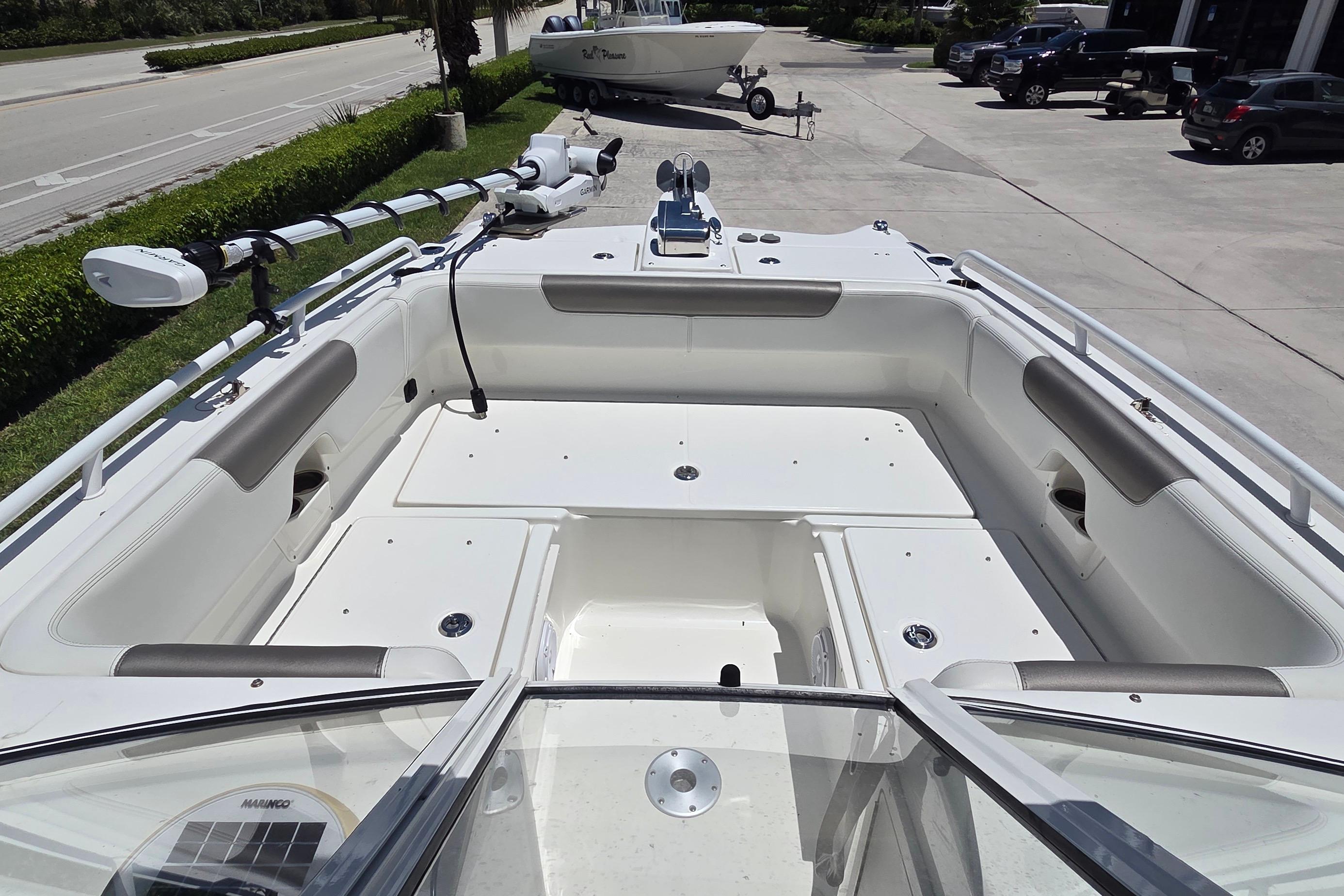 2022 World Cat 255 DC boat interior with seating and fishing equipment.