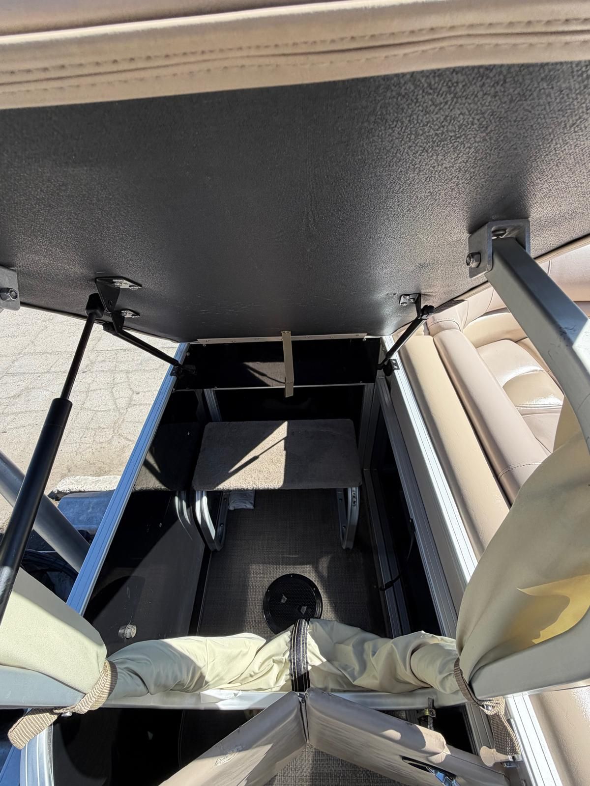 Interior view of a 2015 Regency 220DL3 pontoon boat.