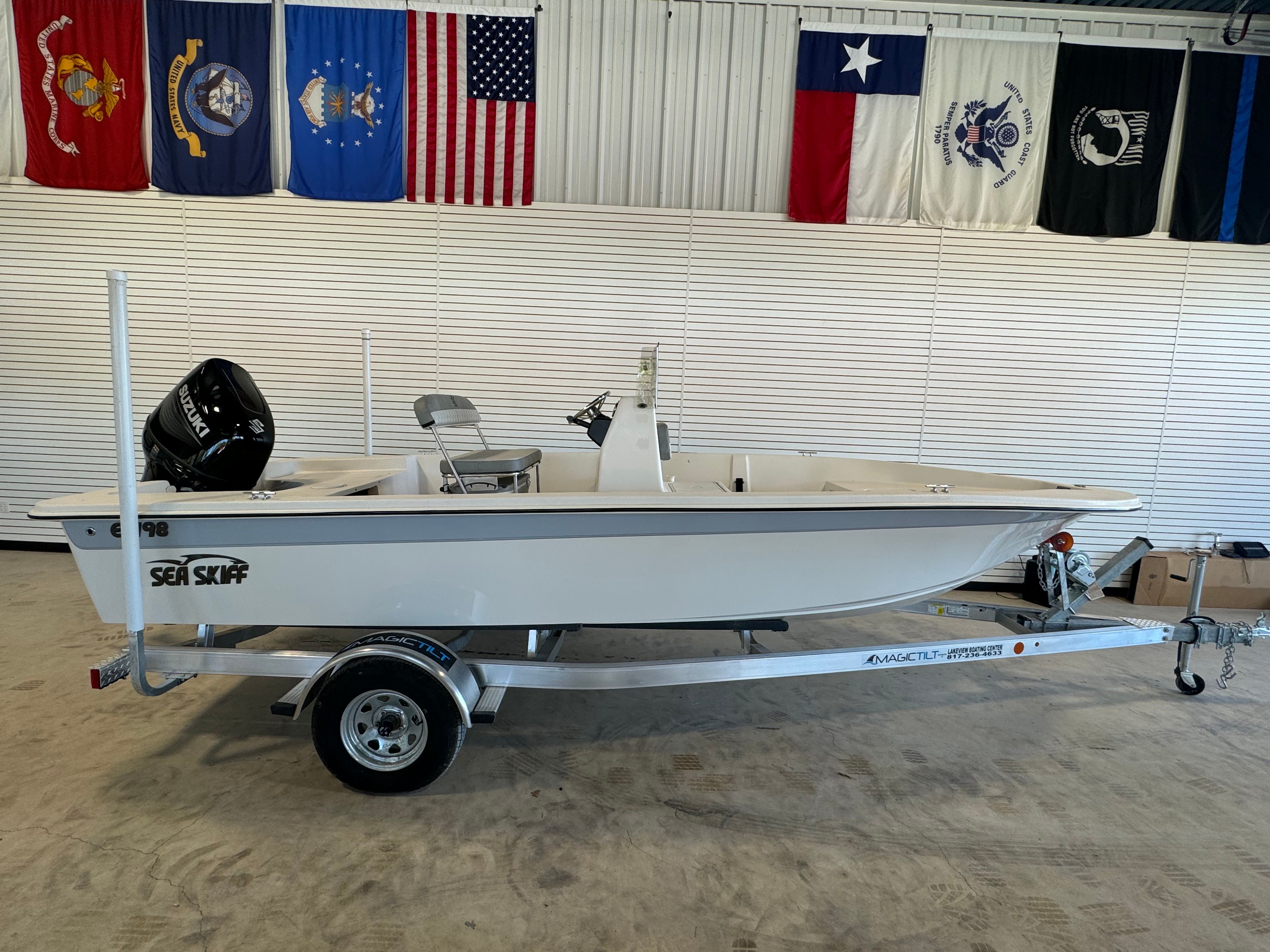 2025 Carolina Skiff EV198 with 150HP Suzuki and custom aluminum trailer
