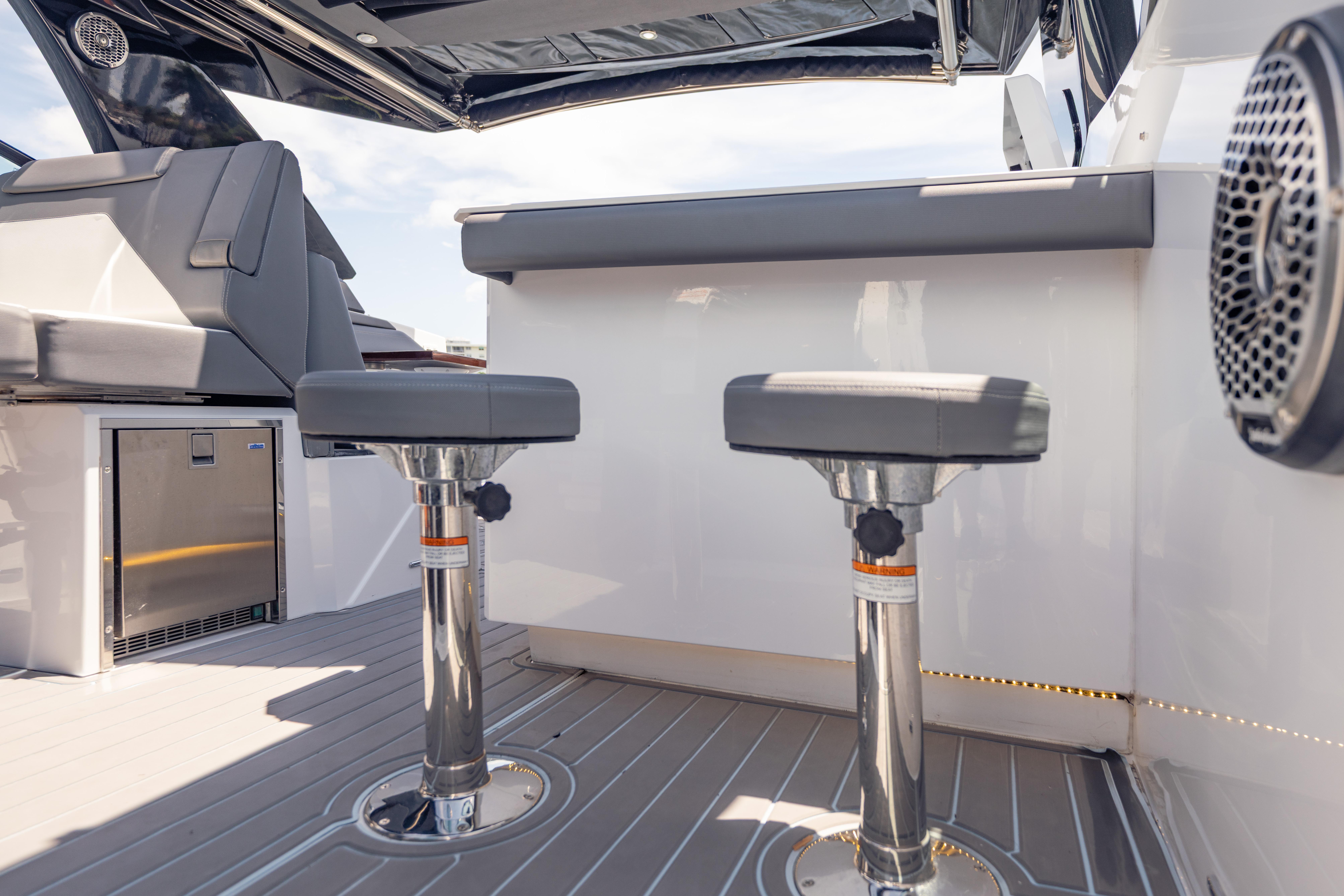 2021 Cruisers Yachts 38 GLS interior with modern seating and sleek design elements.