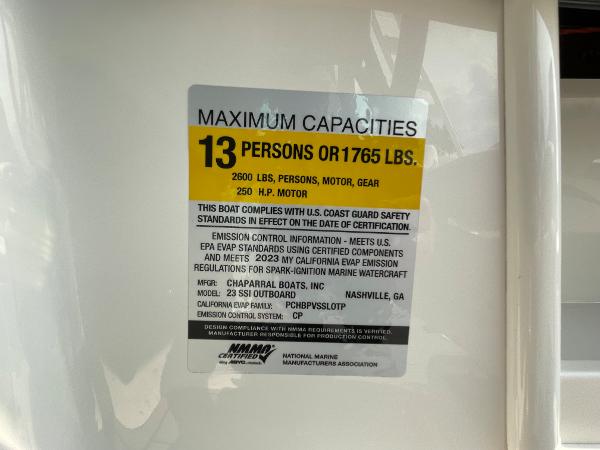 2024 Chaparral 23 SSi OB boat capacity label, 13 persons or 1765 lbs.