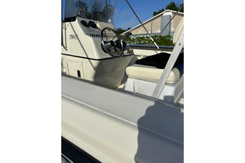 2005 Hydra-Sports Lightning 180 CC boat interior with steering wheel and seating.