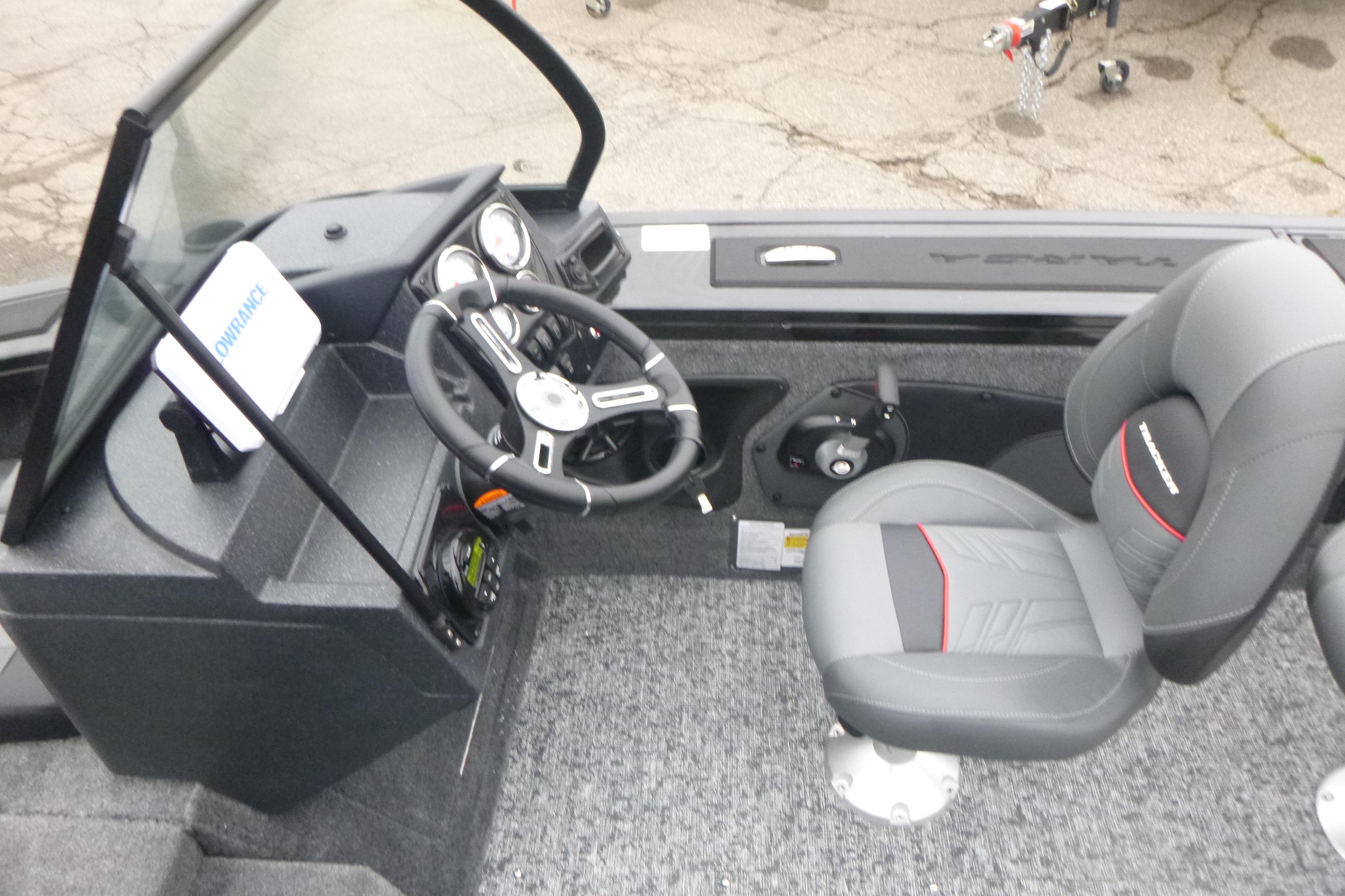 2026 Tracker Targa V-18 Combo boat interior with steering wheel and seating.
