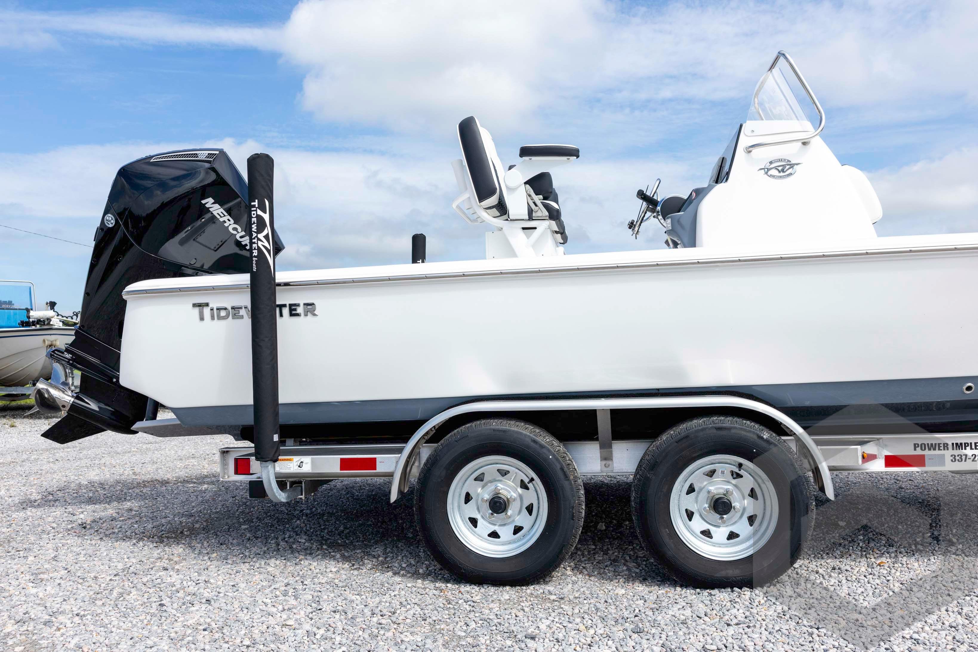 2026 Tidewater 2110 Bay Max boat on trailer, featuring Mercury outboard motor.
