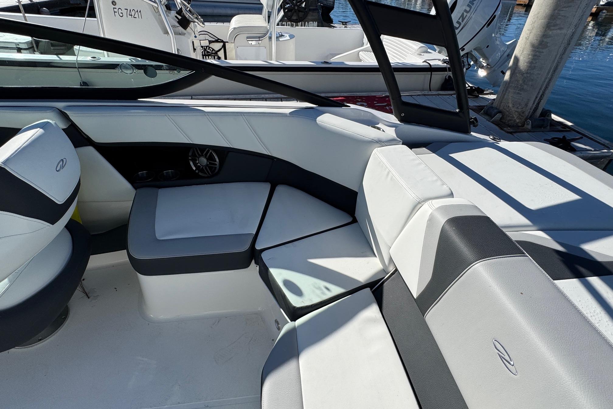 Interior seating of 2026 Regal 21 OBX boat, featuring modern design and comfortable upholstery.