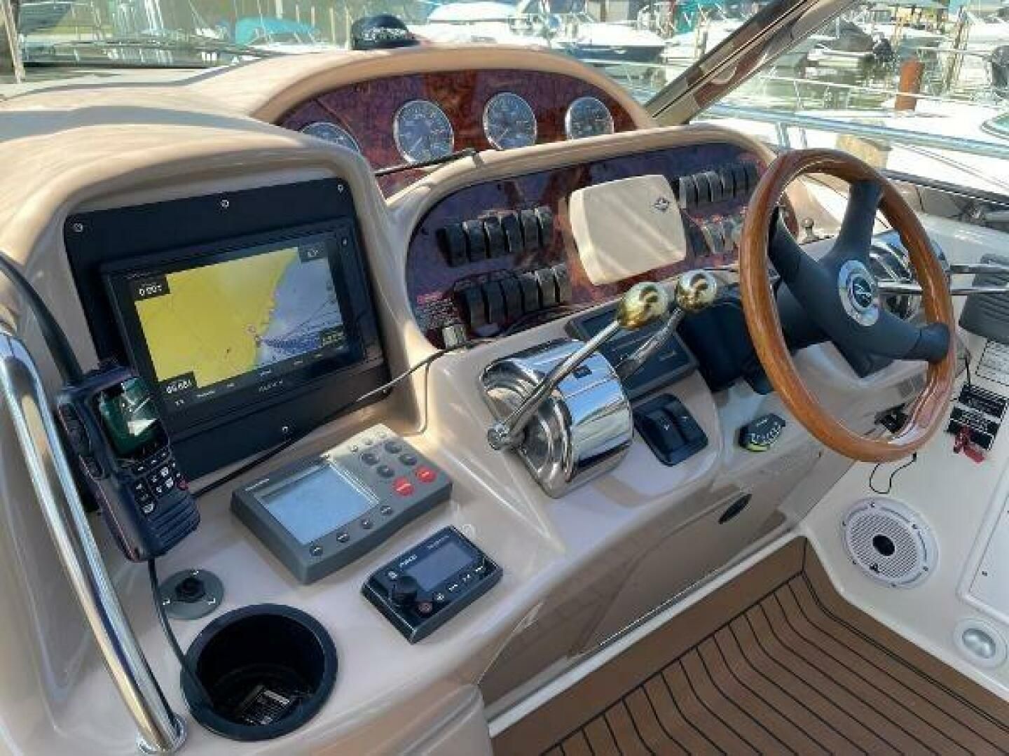 Helm console of a 2005 Sea Ray Sundancer yacht.