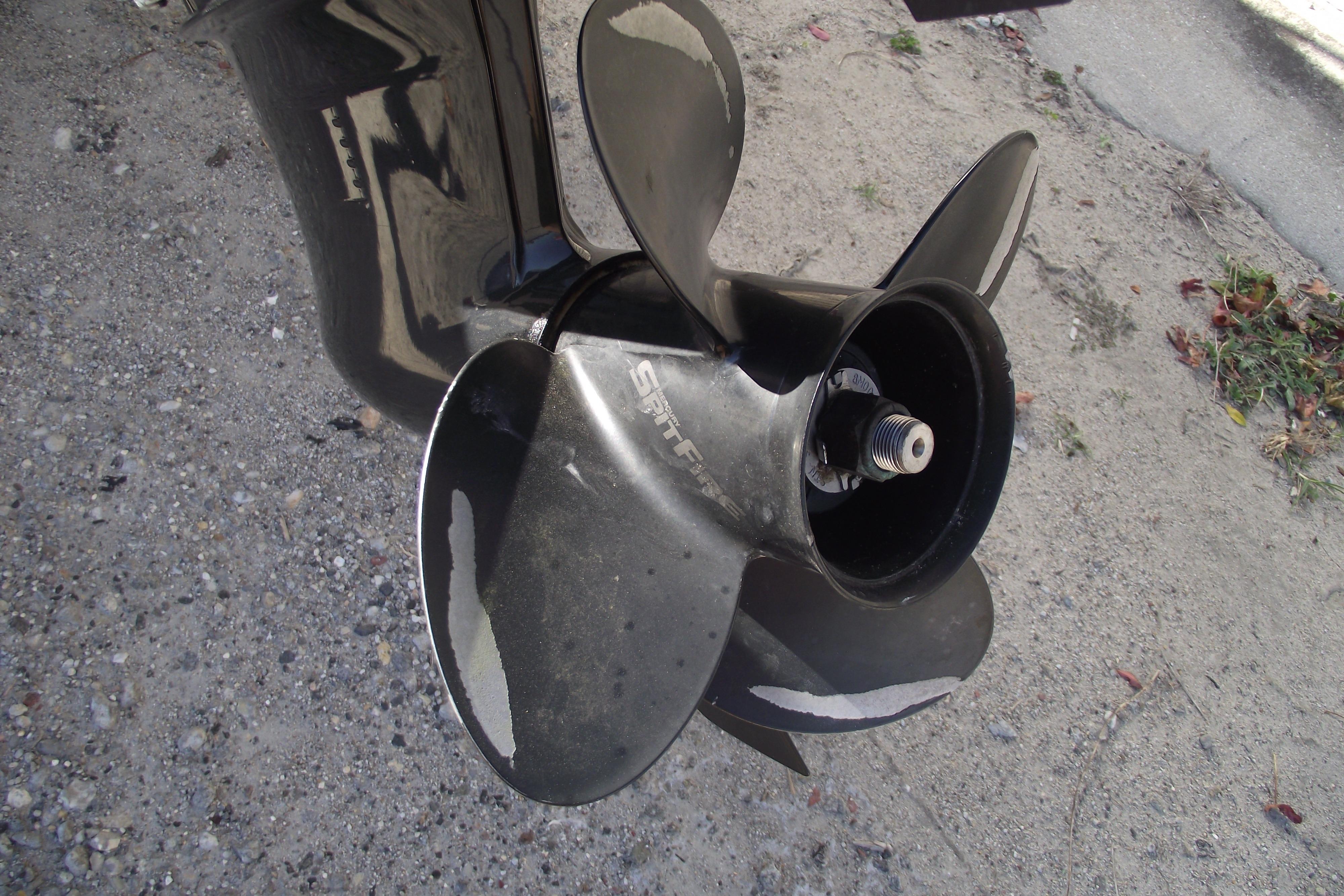 2022 Bayliner VR4 Bowrider OB propeller, showing wear and tear.