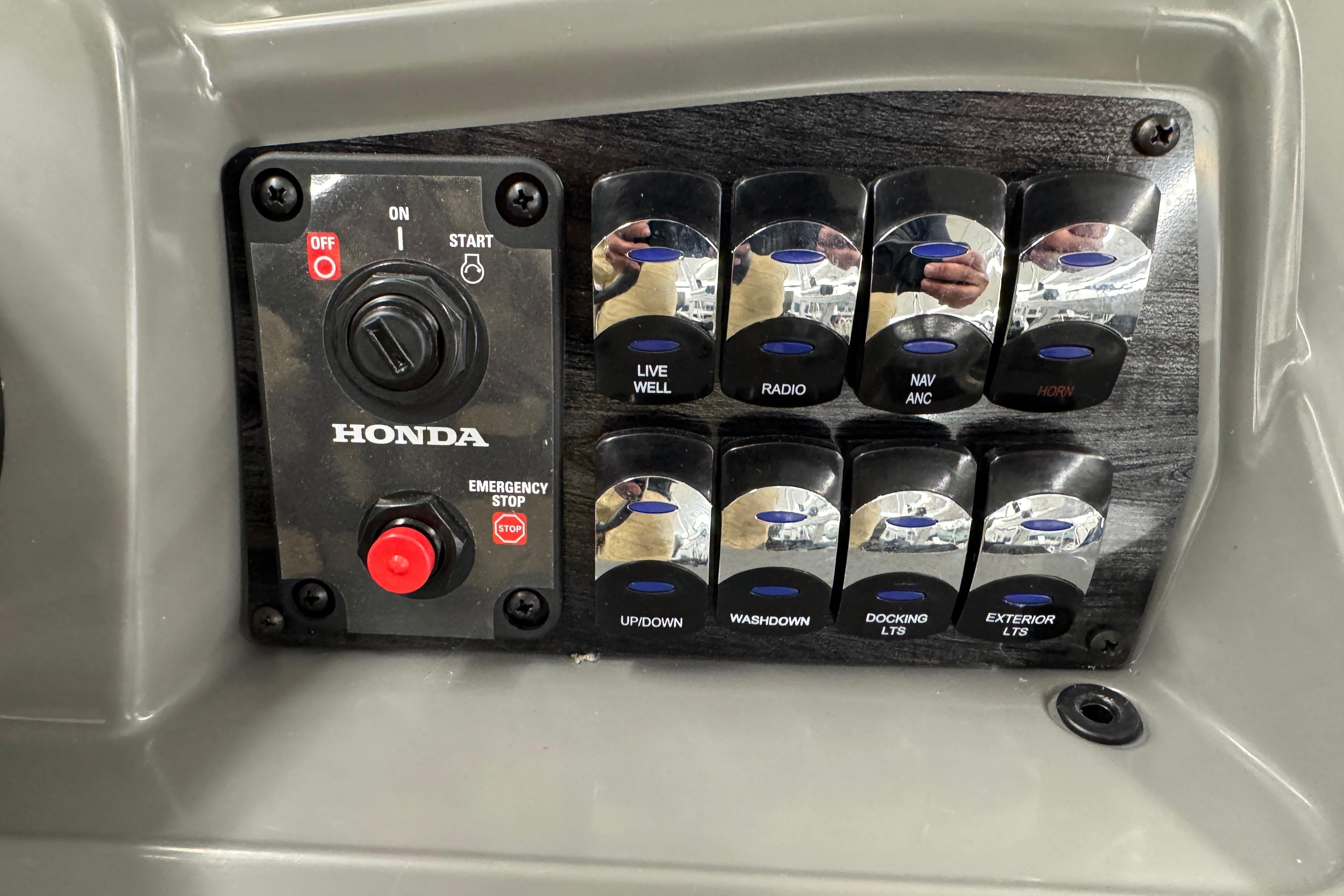 Control panel of a 2026 Avalon Ventue 85 RF boat with Honda ignition and switches.