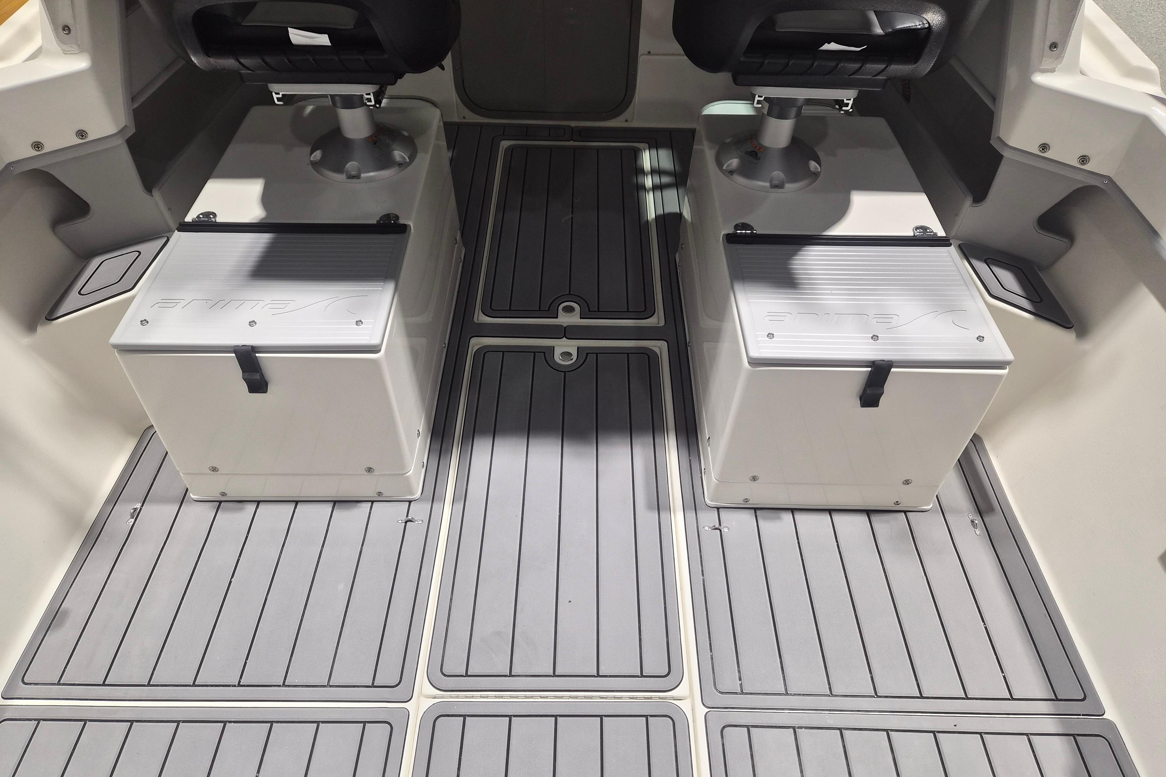 Interior of 2026 Arima Sea Chaser 19 Yellowtail Edition with dual seats and storage compartments.