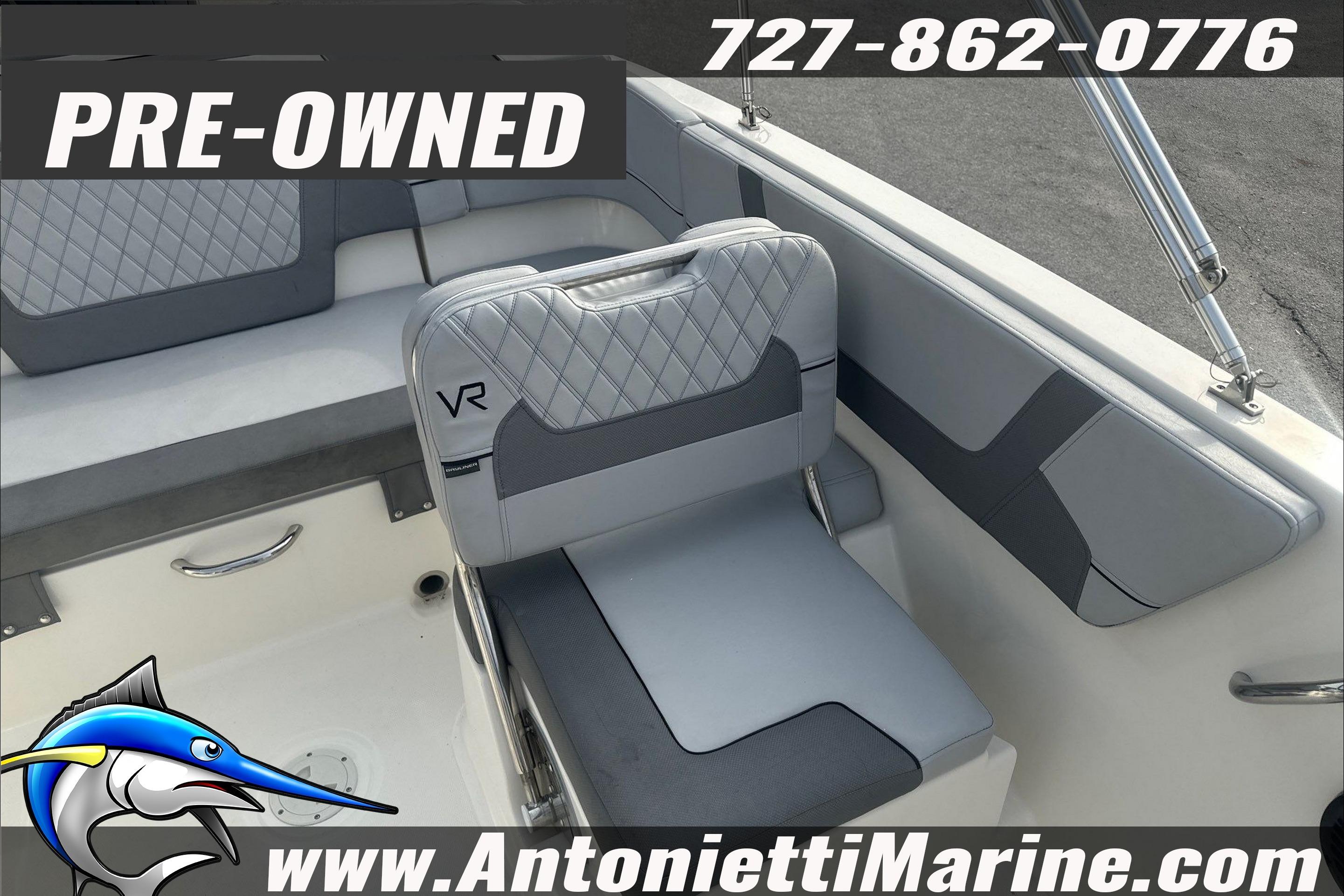 Pre-owned 2022 Bayliner VR6 Bowrider OB boat interior with gray seating.