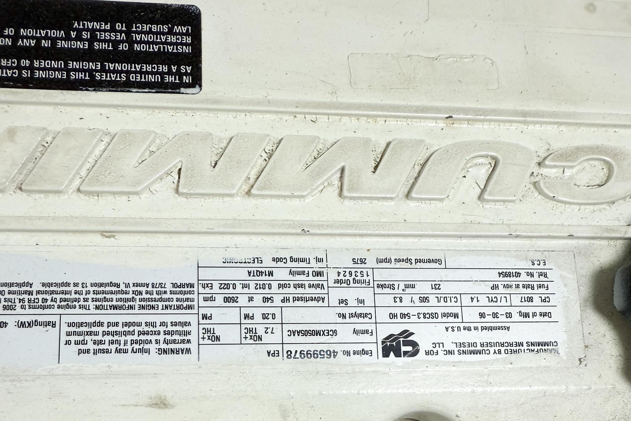 Close-up of a Cummins engine label on a 2007 Nordic Tug 54.