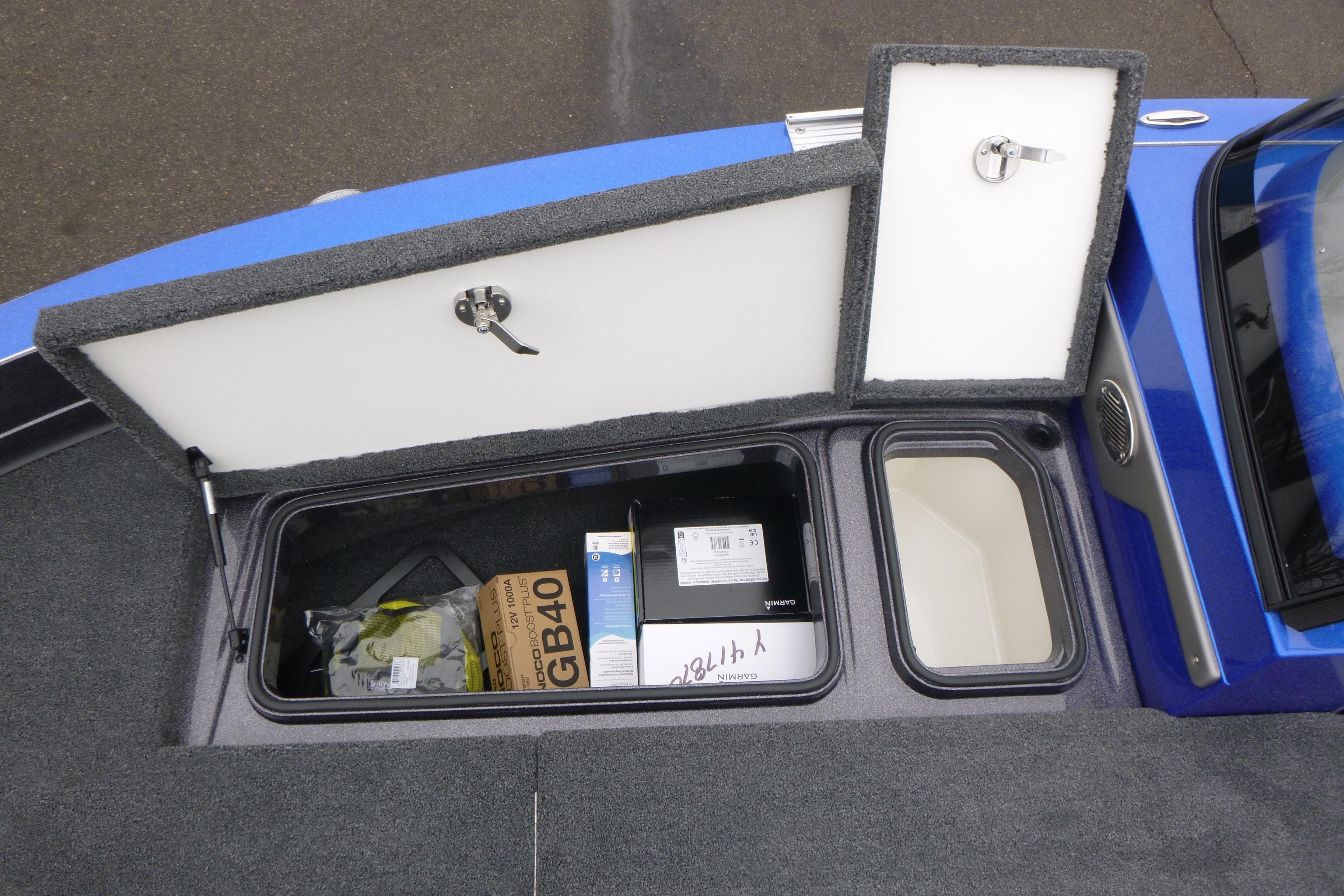 Storage compartments in a 2026 Ranger 620FS Cup Equipped boat, featuring organized gear.
