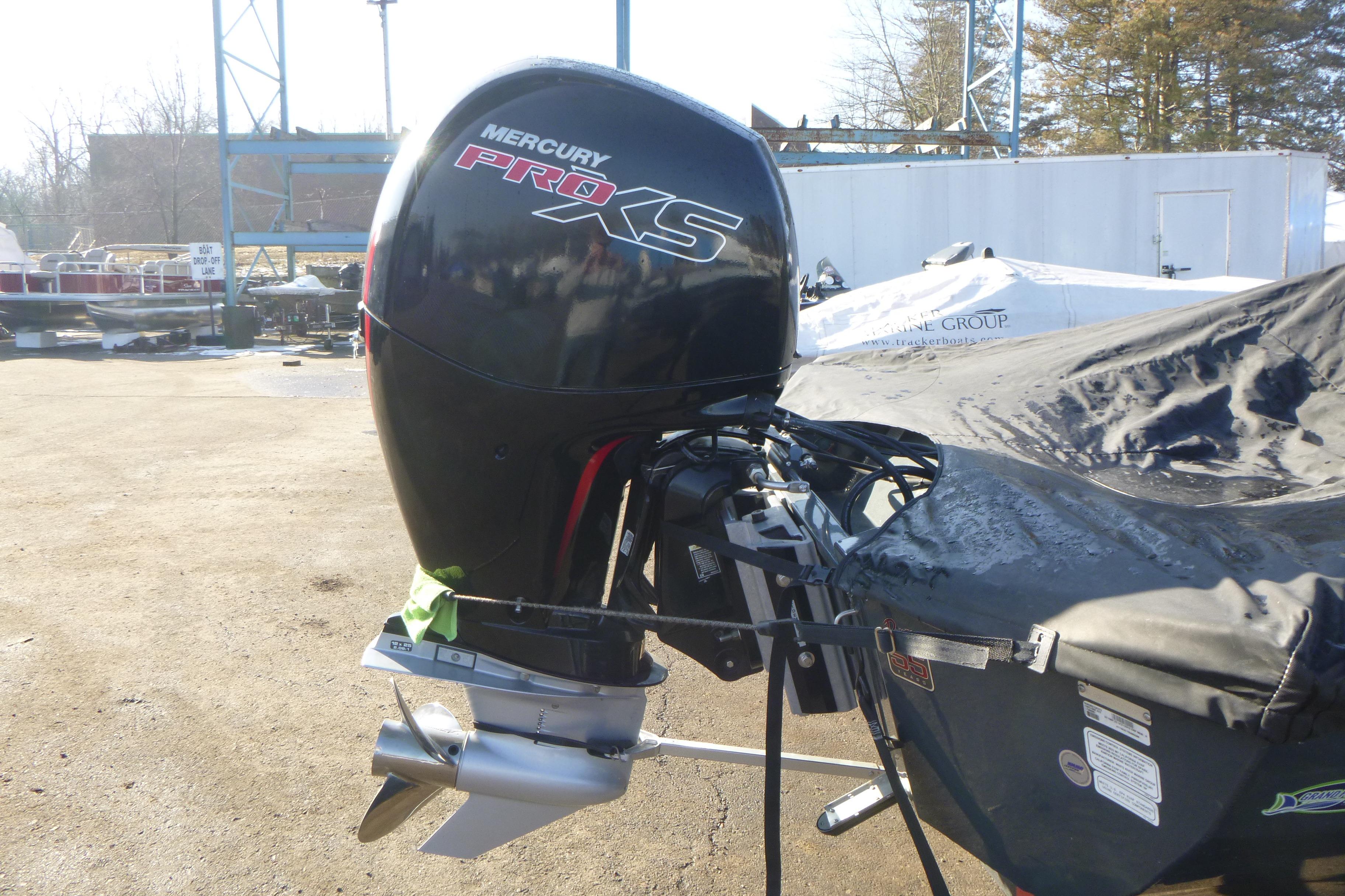 2023 Ranger RT198P boat with Mercury Pro XS outboard motor in a marina setting.