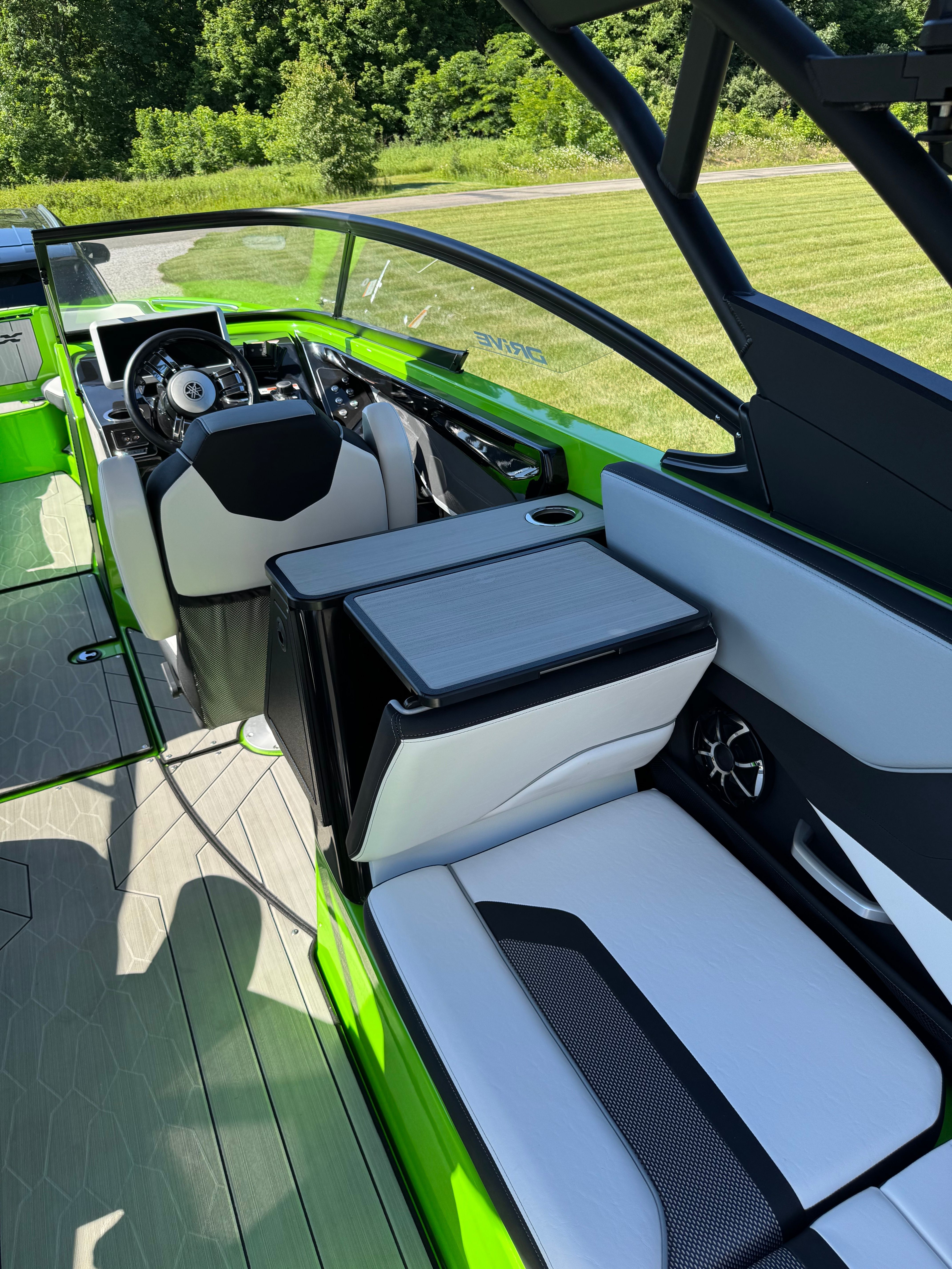 Interior of a 2022 Yamaha 255XD boat with modern seating and controls.