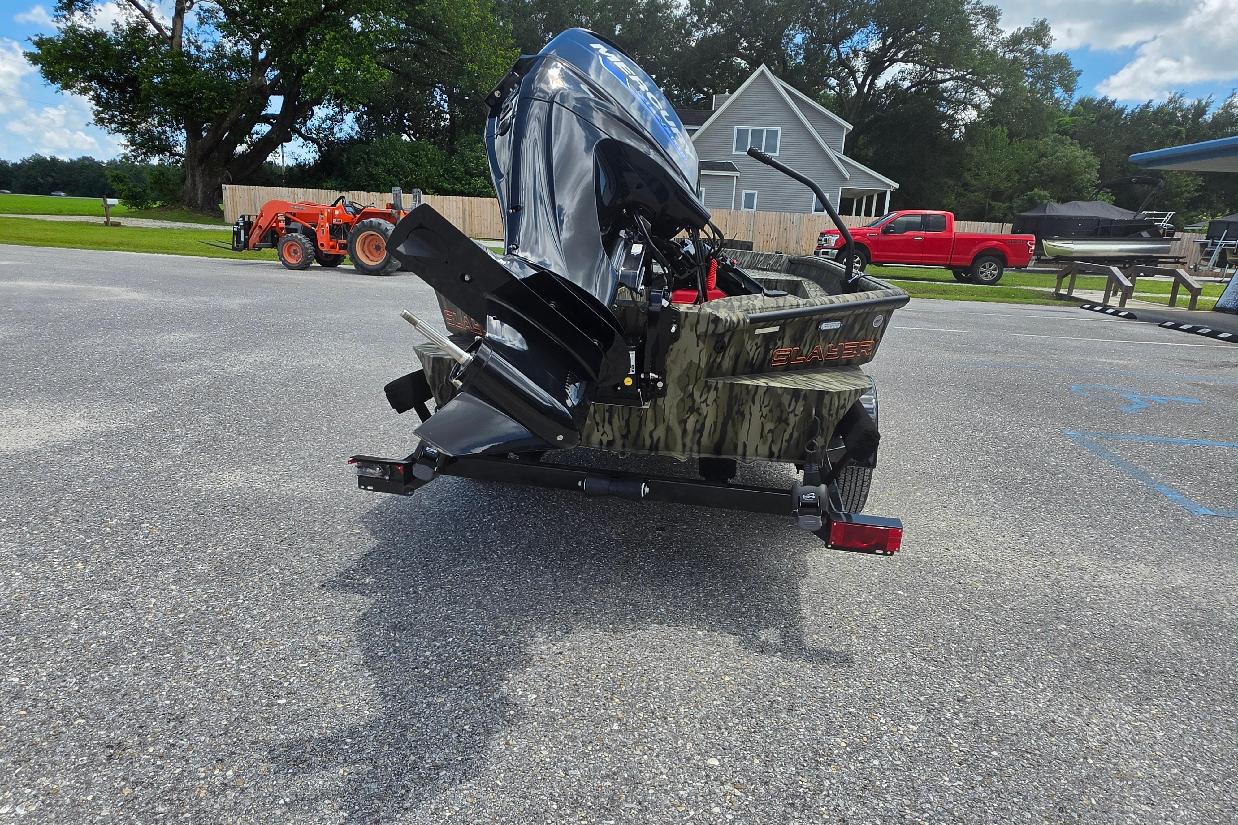 2025 SeaArk 1752 Slayer boat with powerful outboard motor on a trailer.