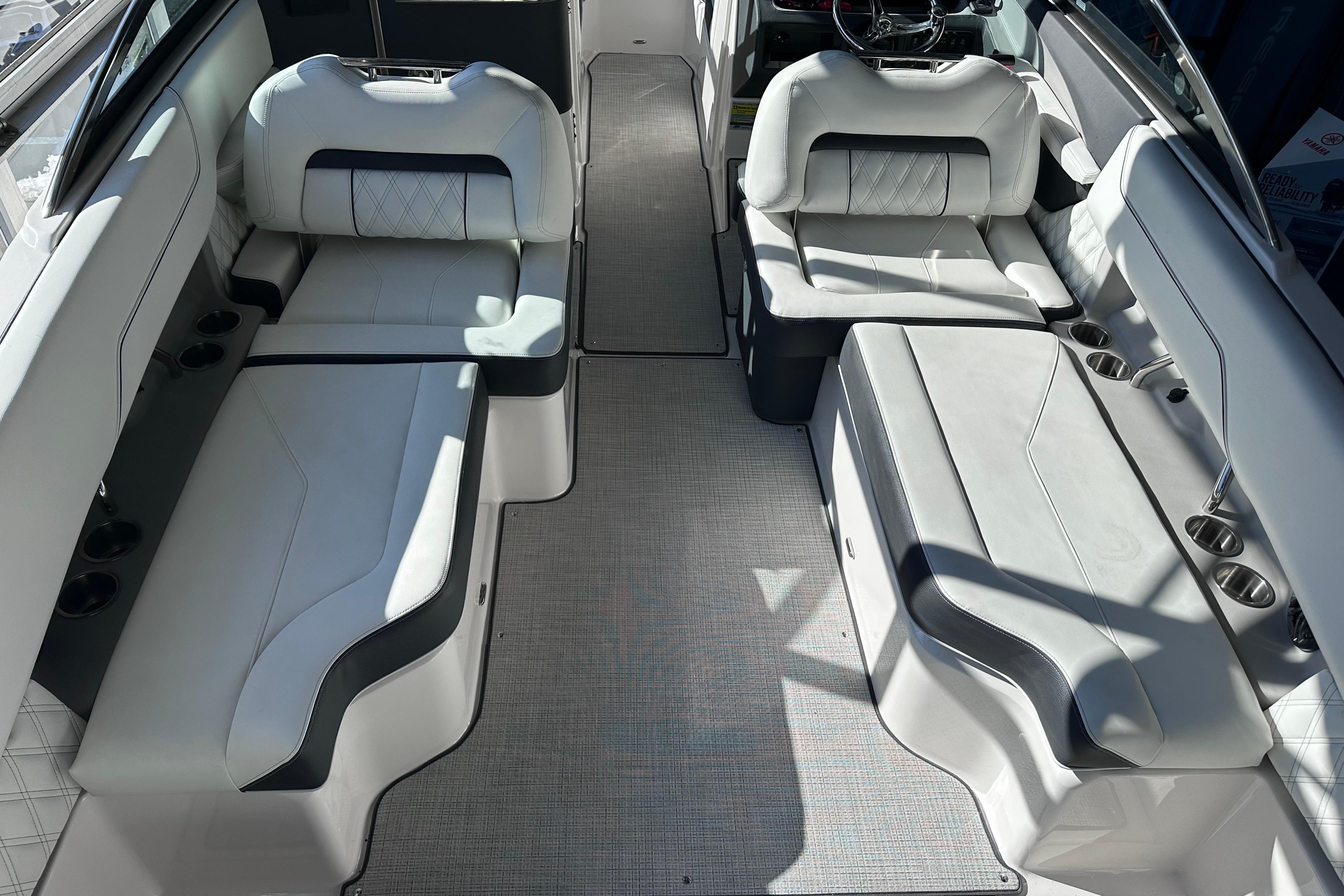 Luxurious interior of 2026 Regal LX4 boat with plush seating and modern design.