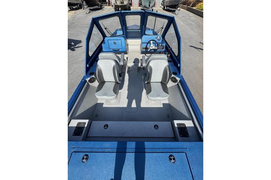 2026 SeaArk Dynasty 2.0 boat interior with dual seats and steering console.