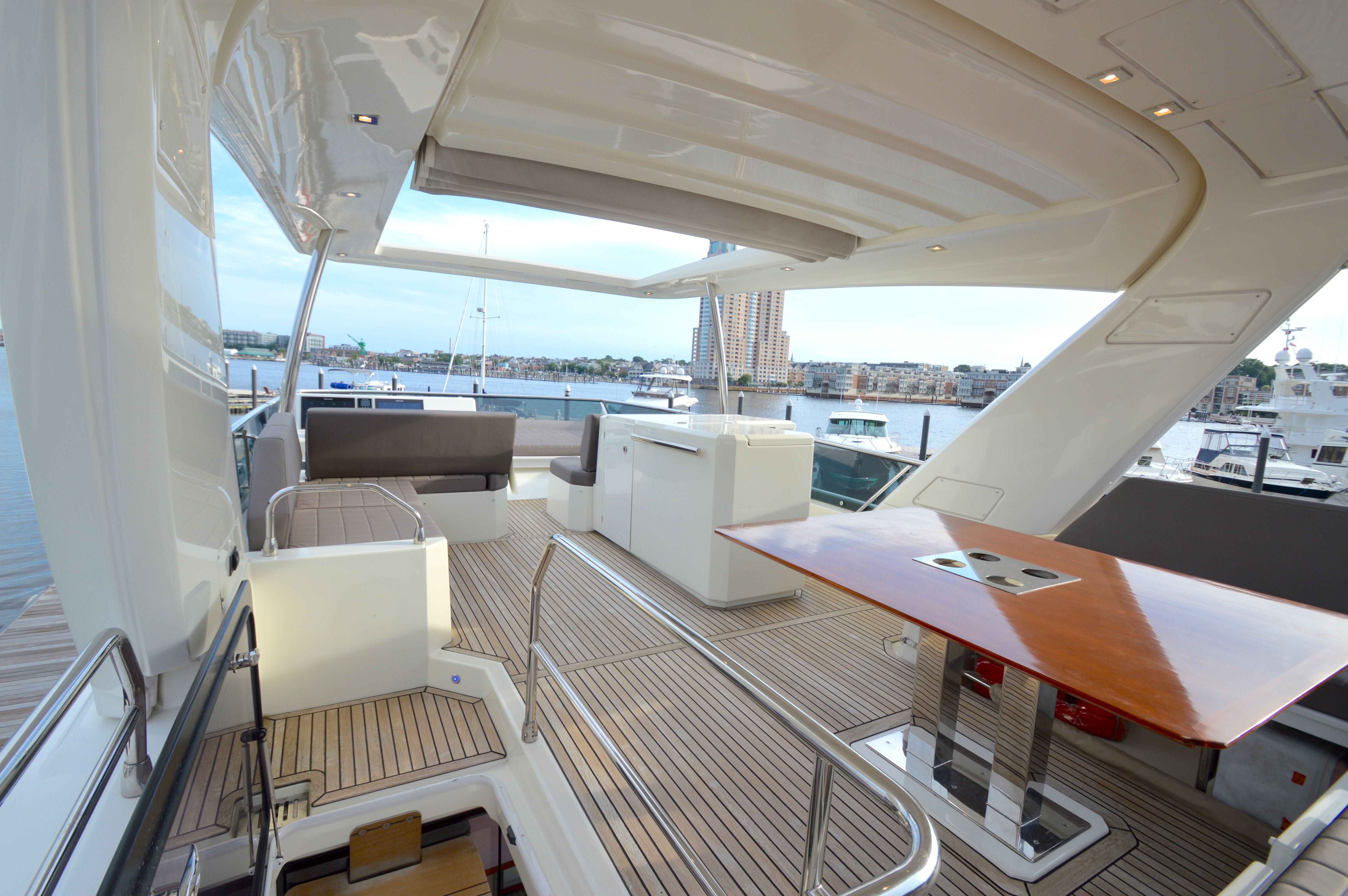 Luxurious interior of Prestige 630 yacht, 2017 model, with harbor view.
