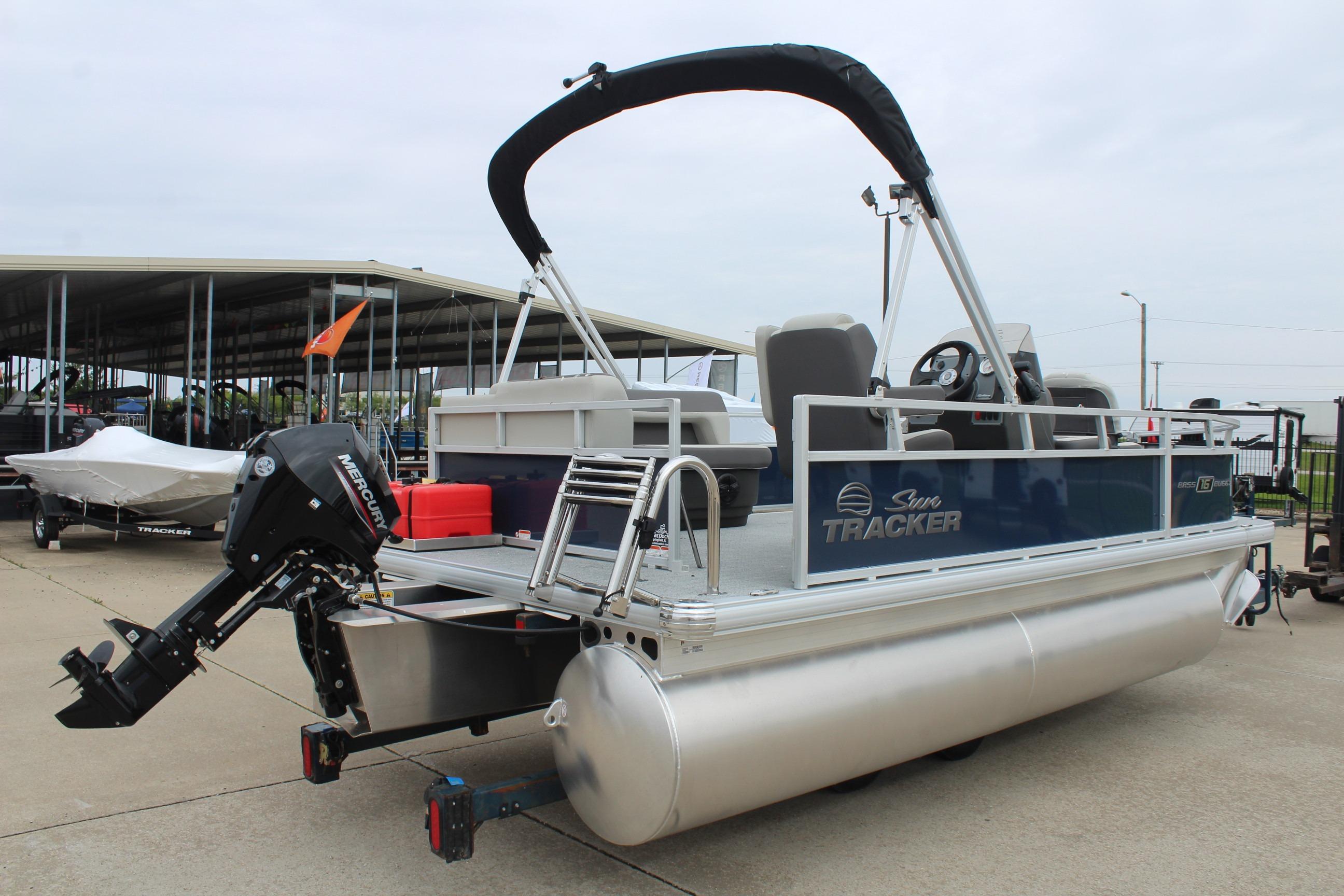 2026 Sun Tracker Bass Buggy 16 XL Select pontoon boat with Mercury outboard motor.