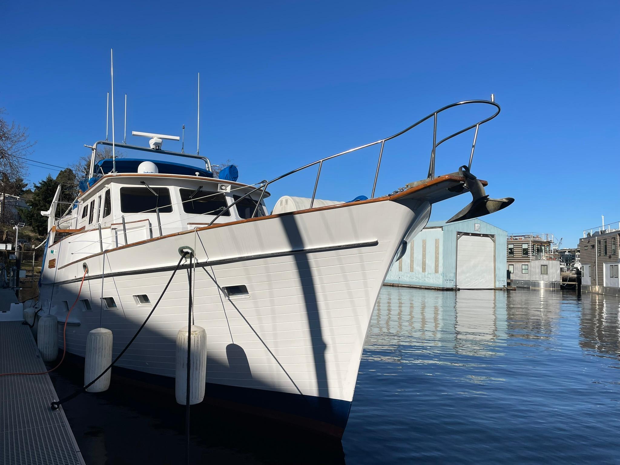 1972 Grand Banks Alaskan 55 yacht docked on a sunny day.