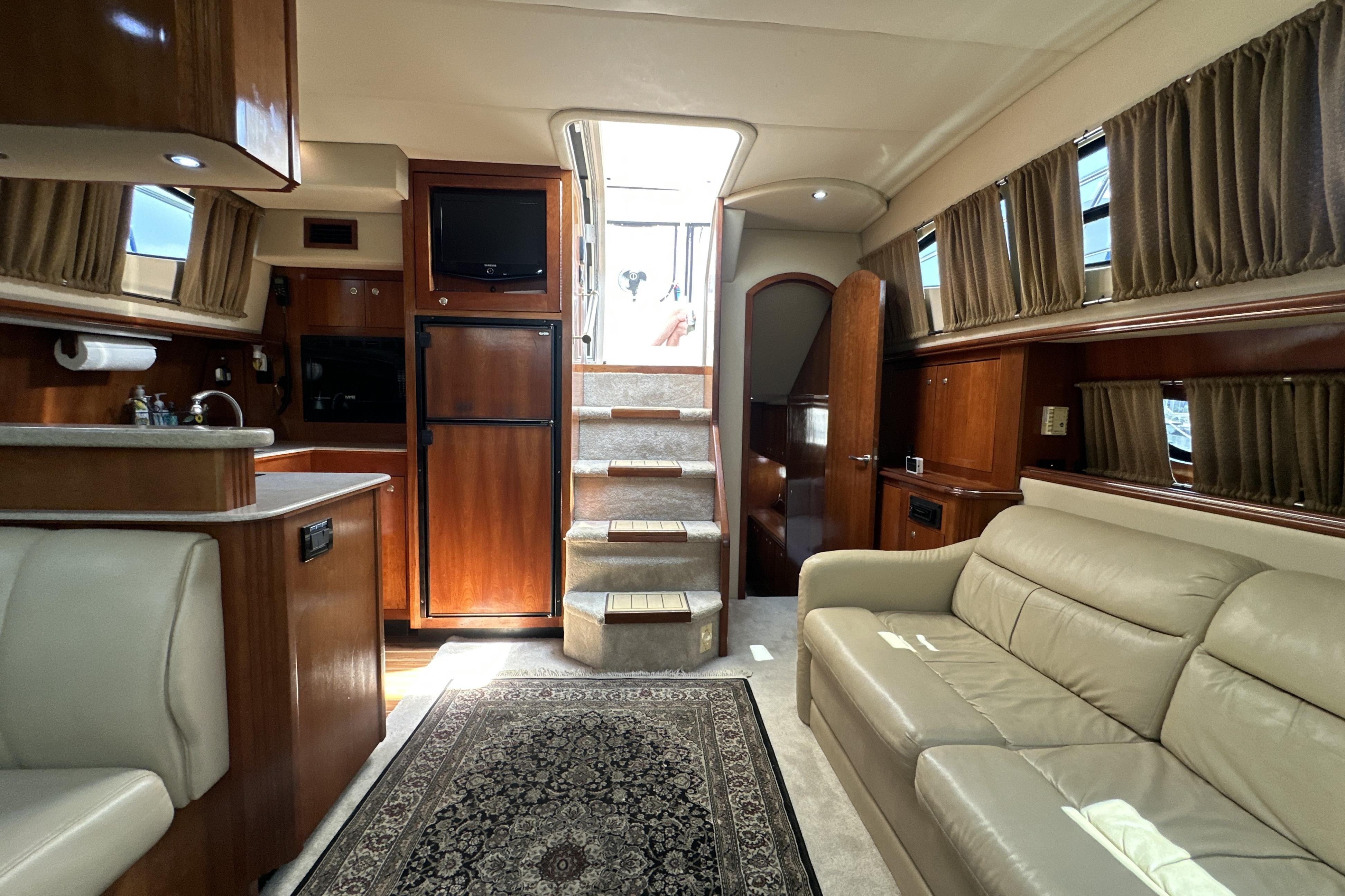 Luxurious interior of 2004 Cruisers Yachts 405 Express Motoryacht with elegant furnishings.