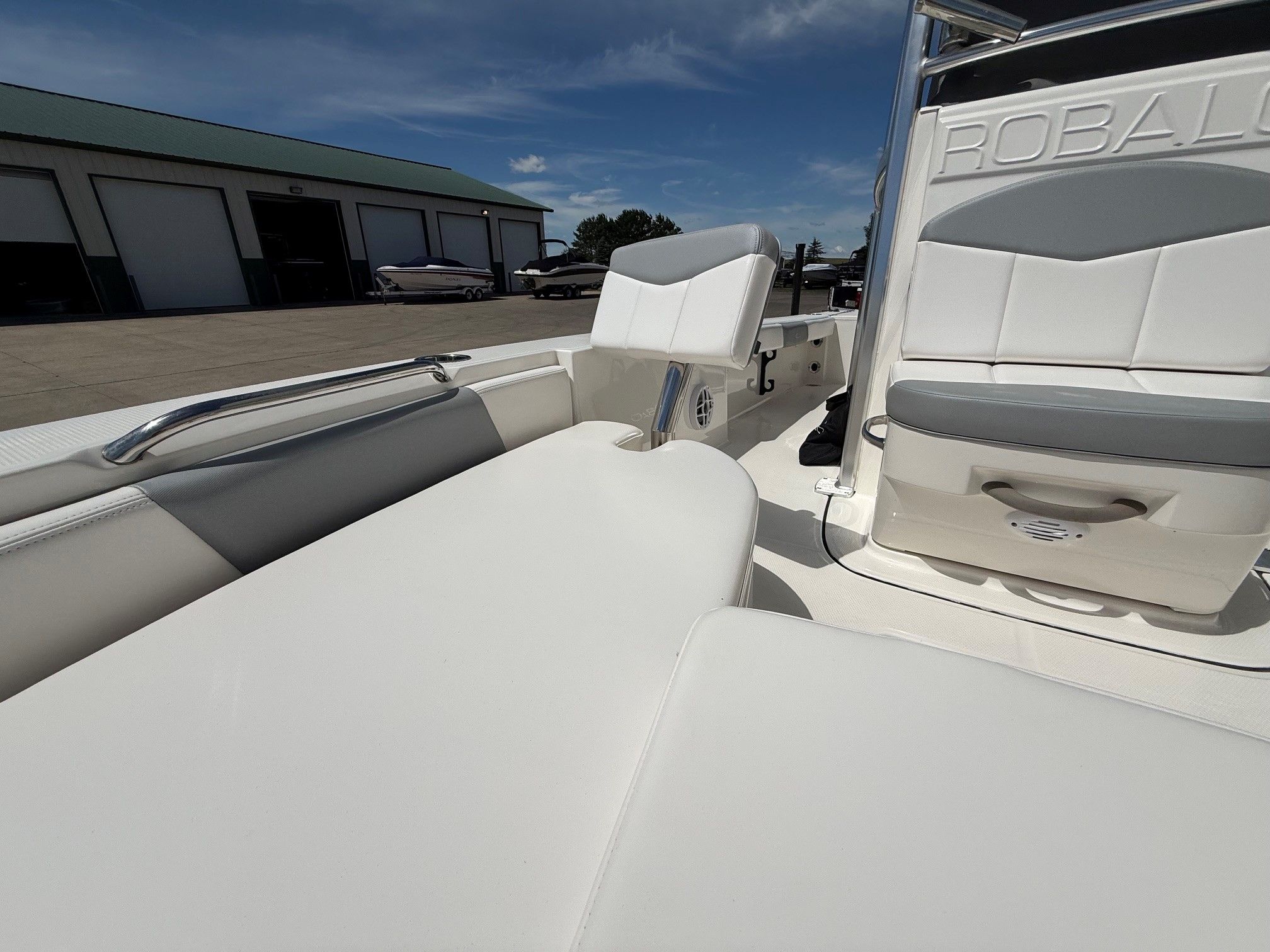 Interior view of a 2021 Robalo 226 Cayman boat at the dock.