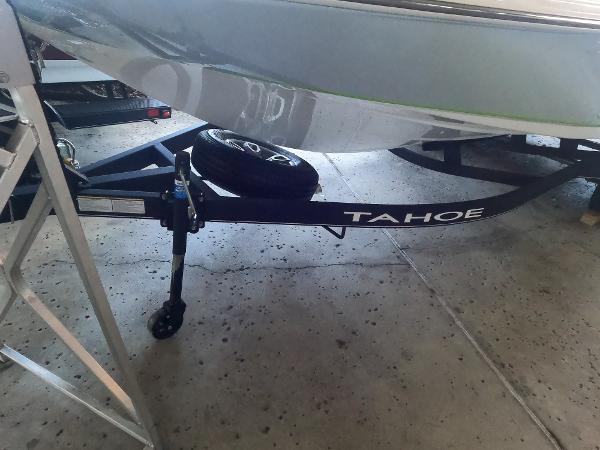 2023 Tahoe 2150 CC boat trailer in a garage setting.