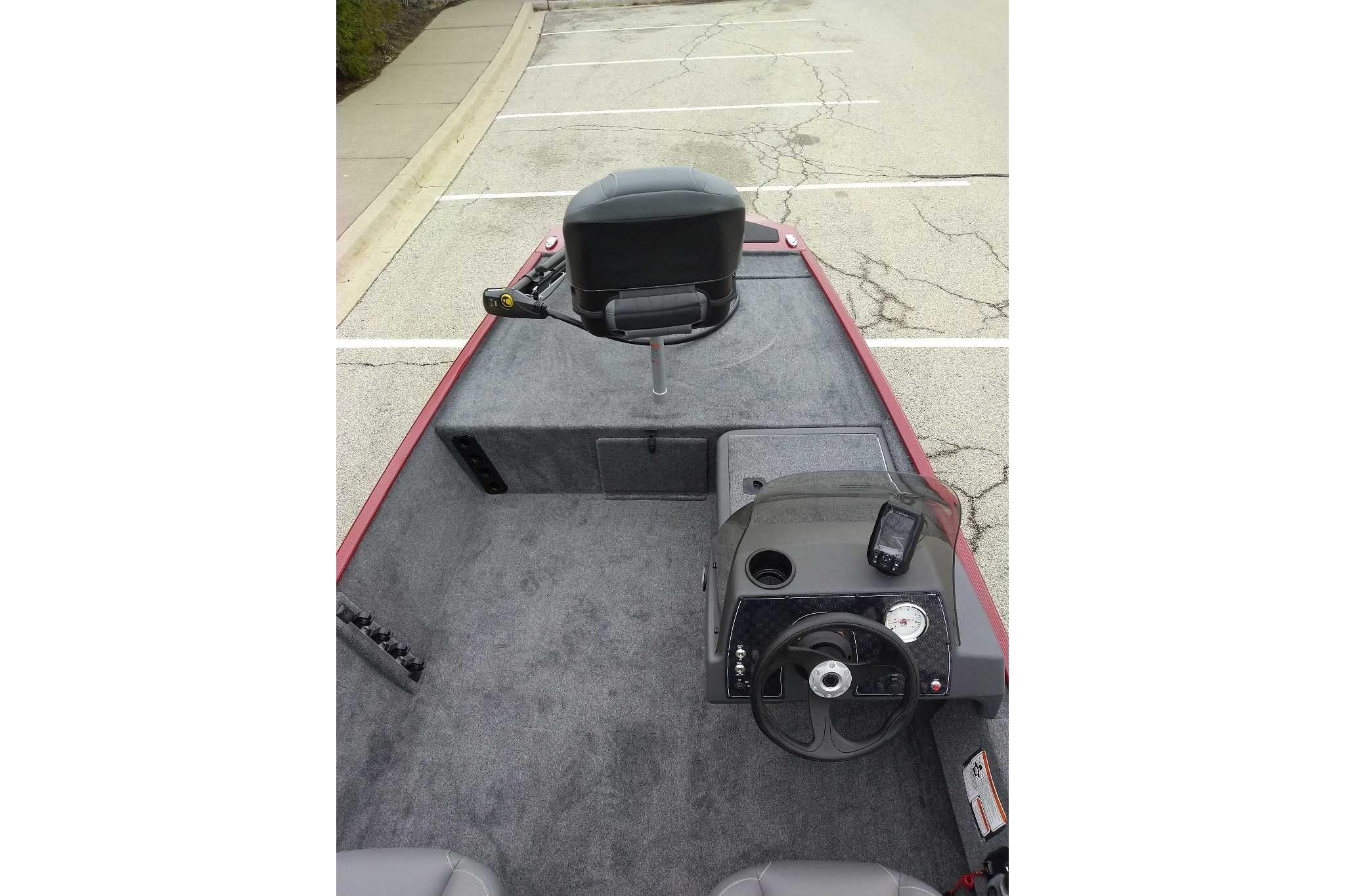 2026 Tracker Bass Tracker Classic XL boat interior with steering console and seating.
