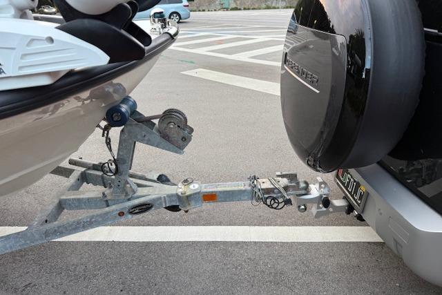 Trailer hitch connecting a 2016 Boston Whaler 150 Montauk boat to a vehicle.