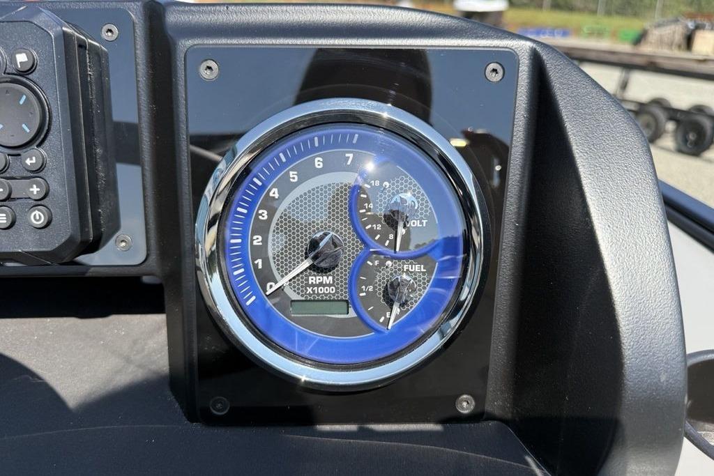 Dashboard of 2026 Premier 220 Sunscape RF with RPM, volt, and fuel gauges.