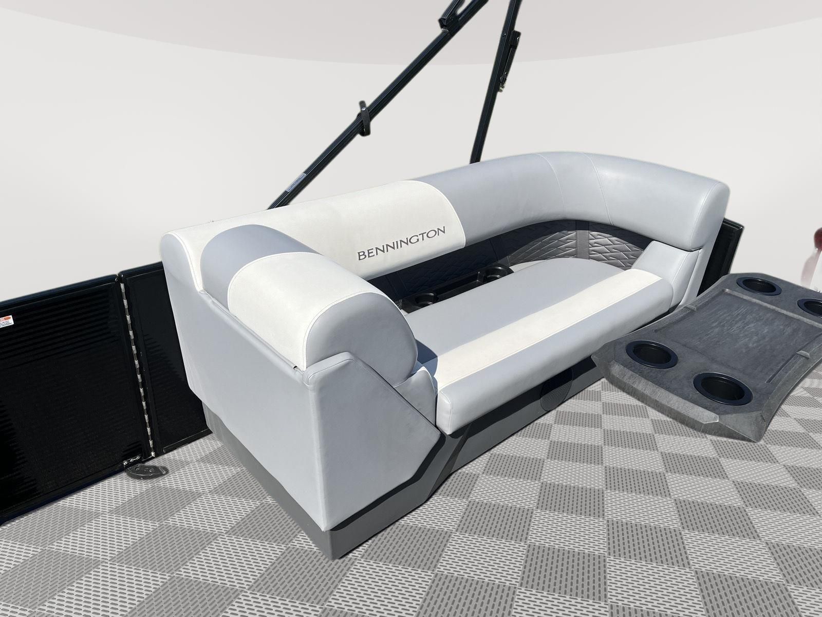 The image shows a sleek bench seat on a 2025 Bennington S20 boat with gray upholstery.