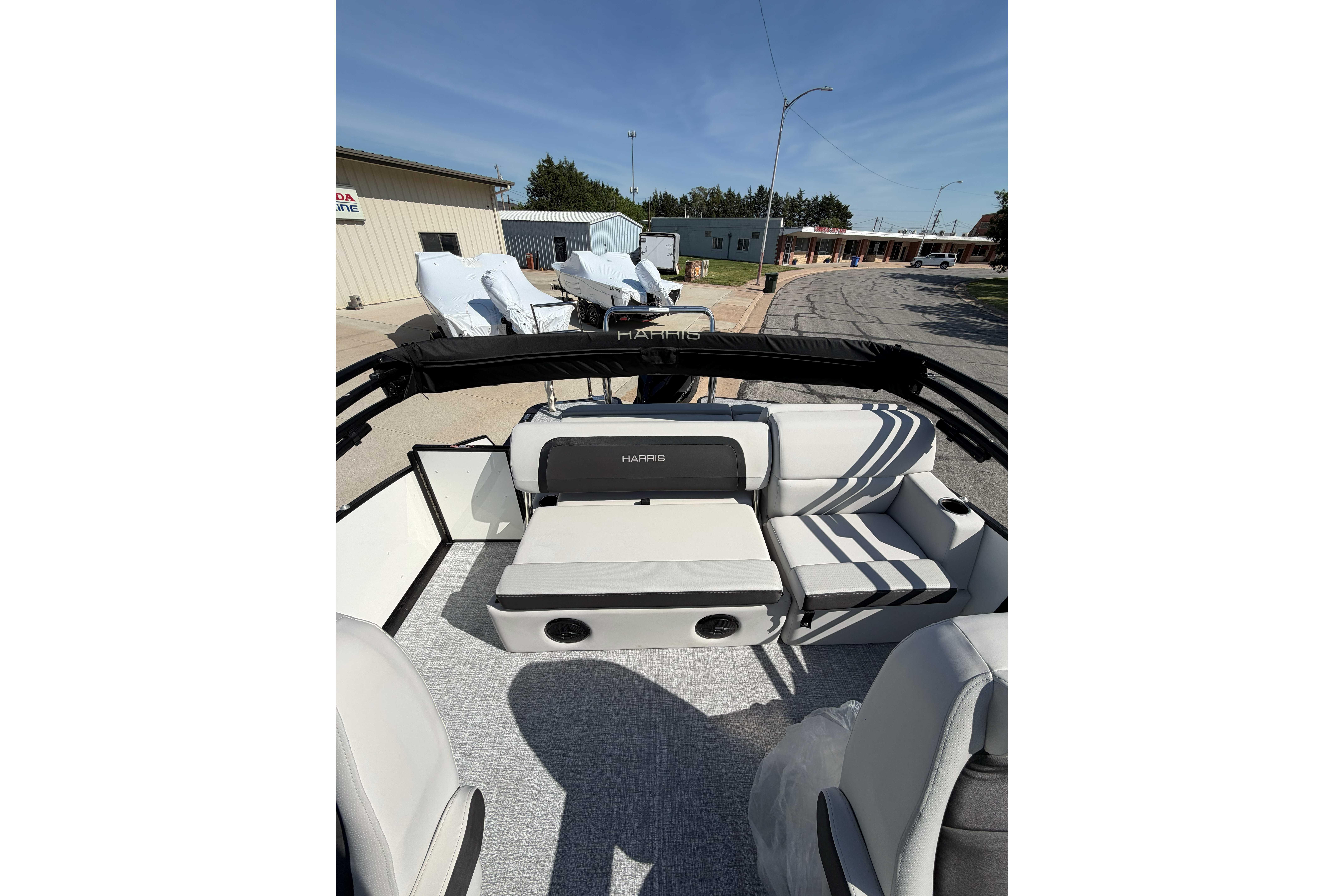2025 Harris Cruiser 250 pontoon boat interior with plush seating and modern design.