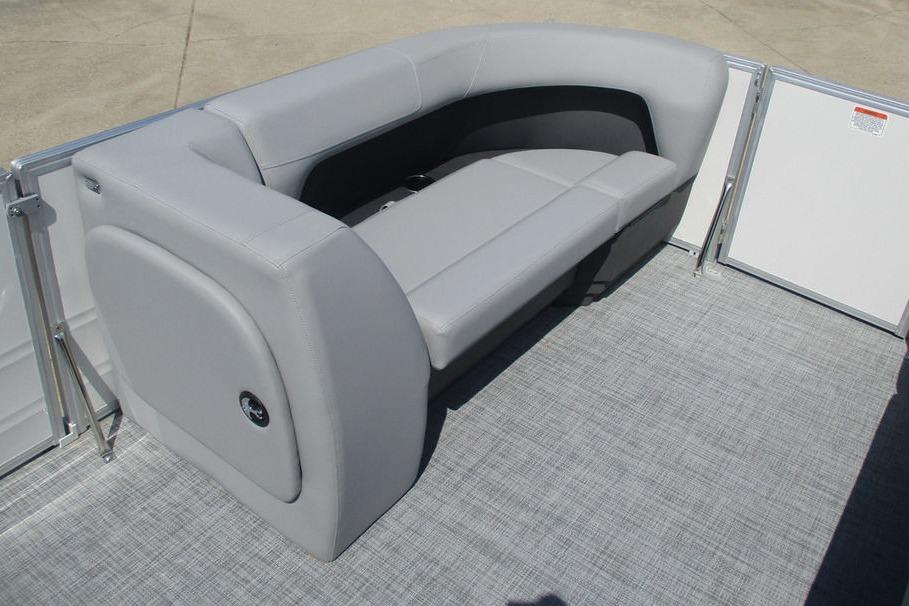 2026 Sun Tracker Party Barge 18 DLX with gray seating and spacious deck.