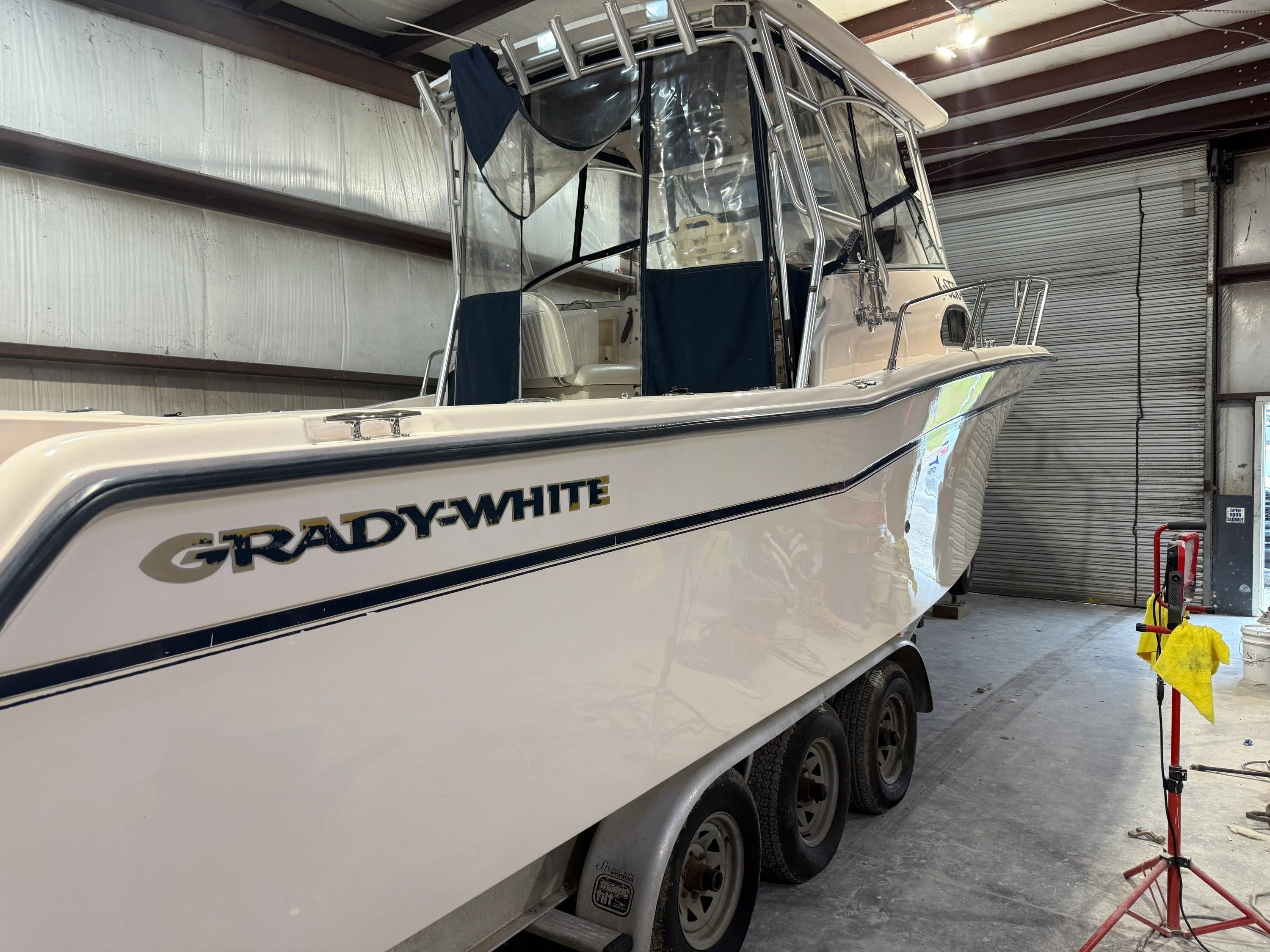 2002 Grady-White Marlin 300 boat in storage facility.