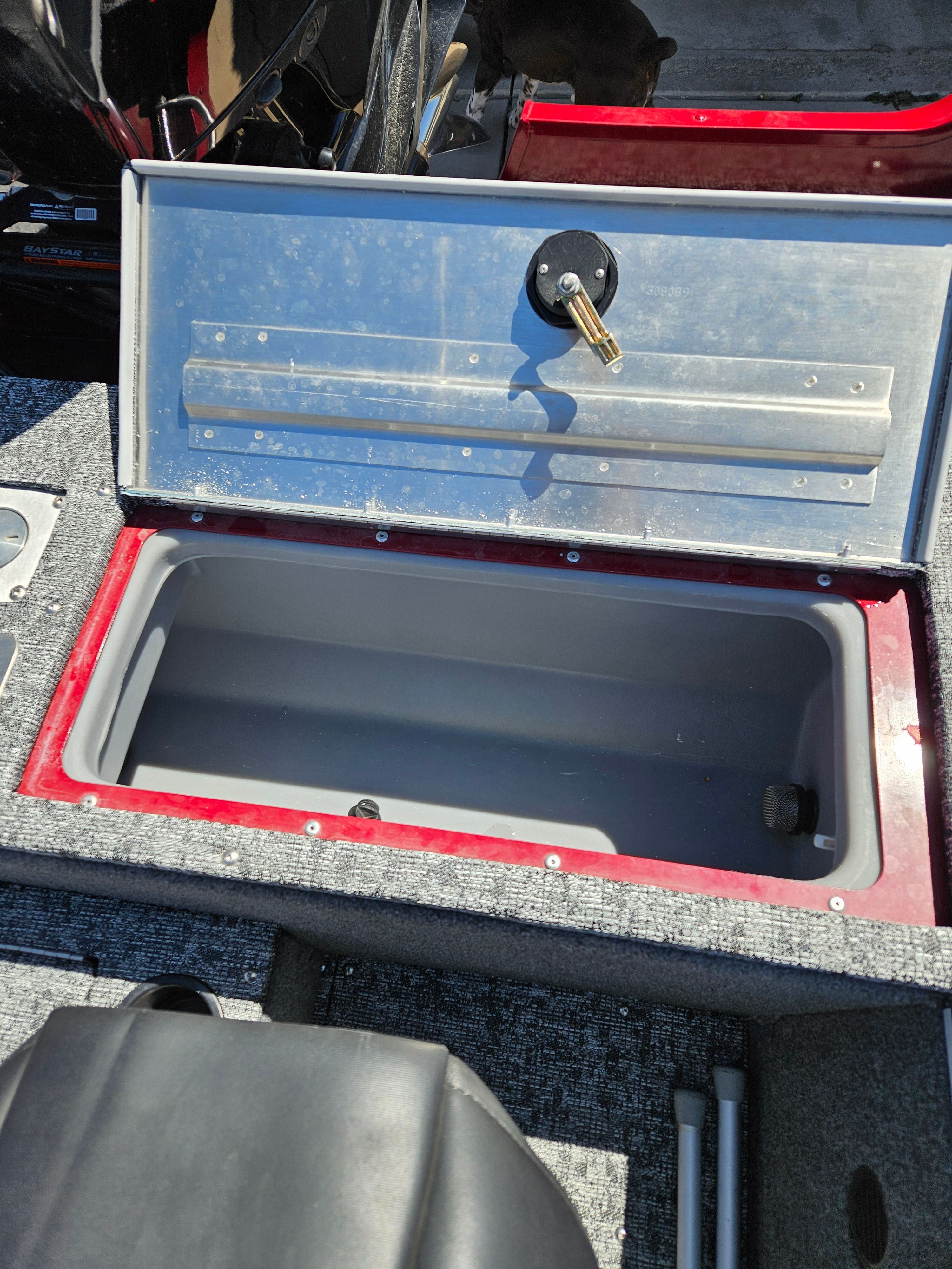 Open storage compartment in 2021 Tracker Pro Guide V-175 WT boat.