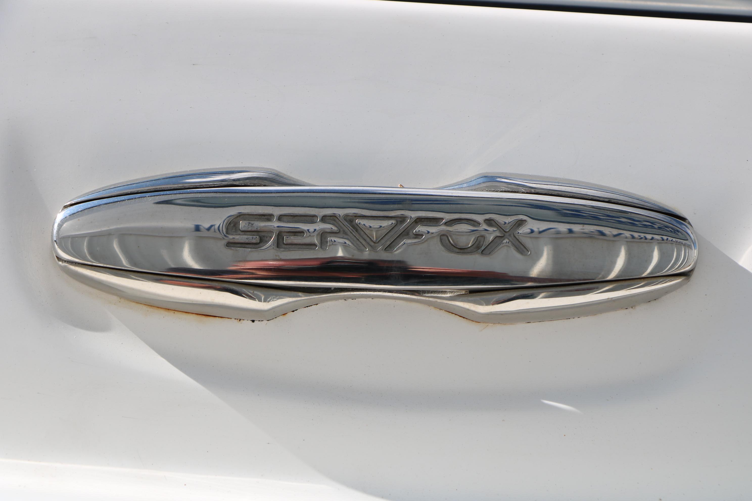 Chrome Sea Fox logo on a 2017 Sea Fox 226 Traveler boat.