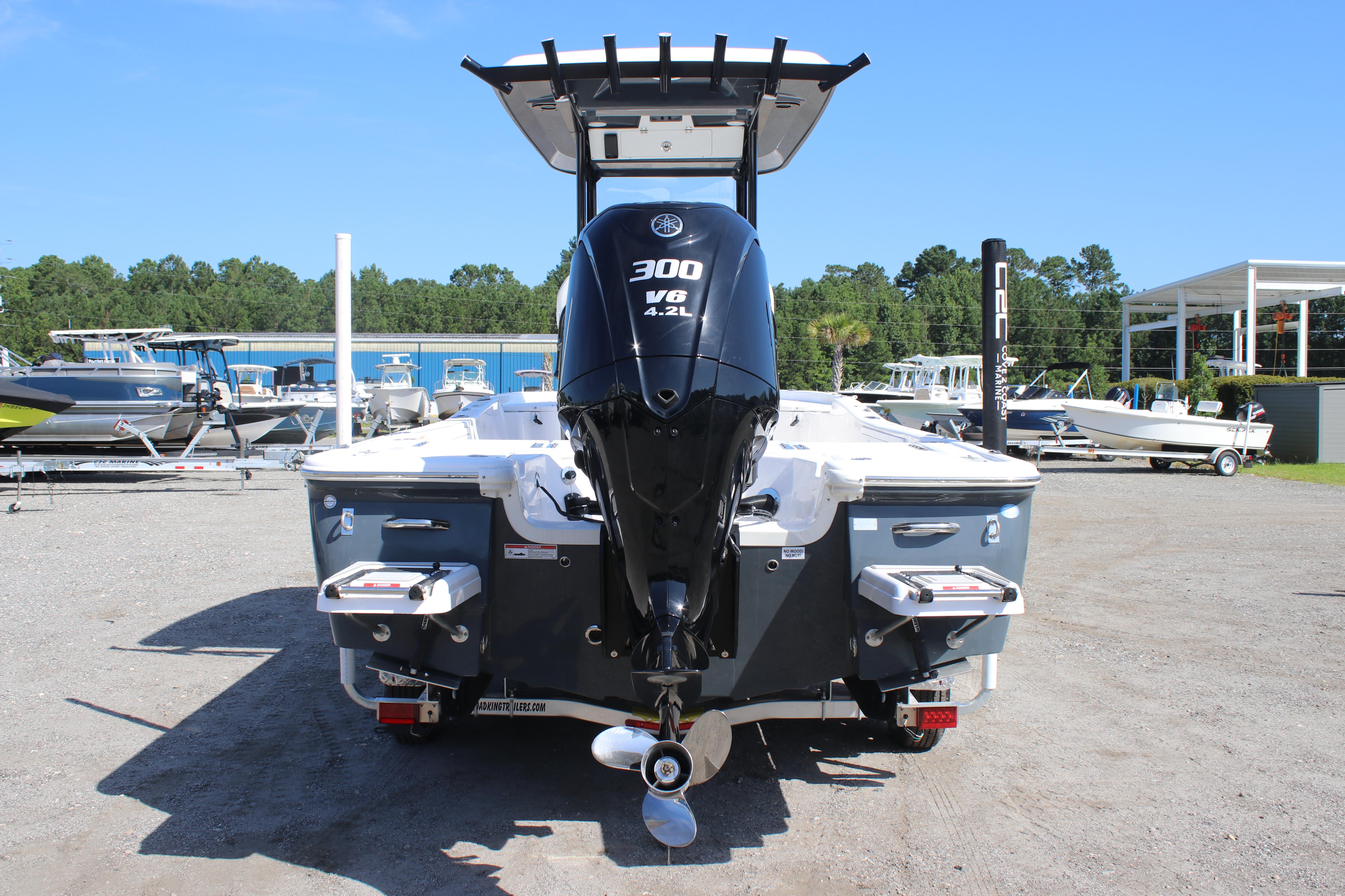 2025 Sea Fox 251 Bay Fox boat with powerful 300 V6 engine, displayed outdoors.