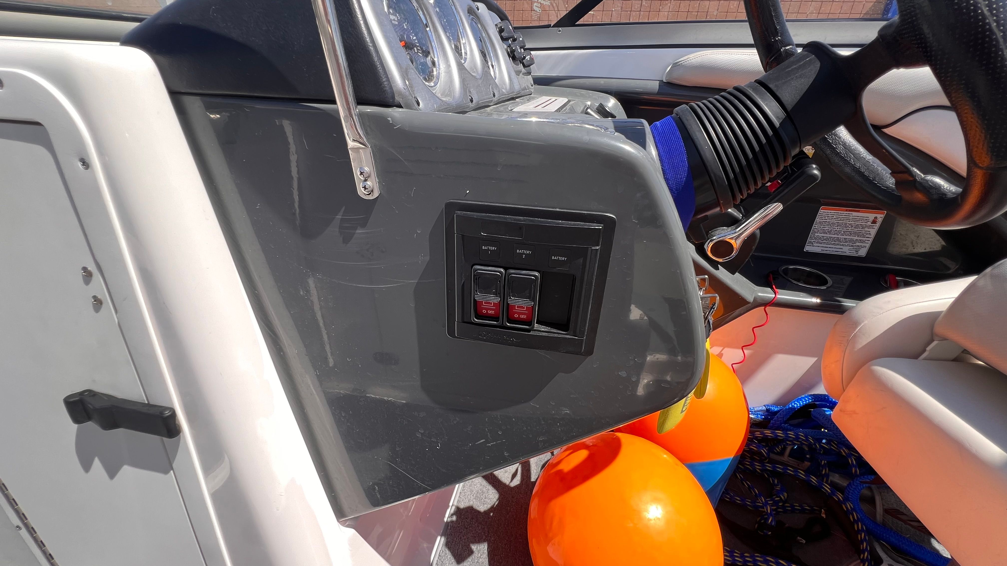 Yamaha AR240 HO 2011 boat console with switches and controls.