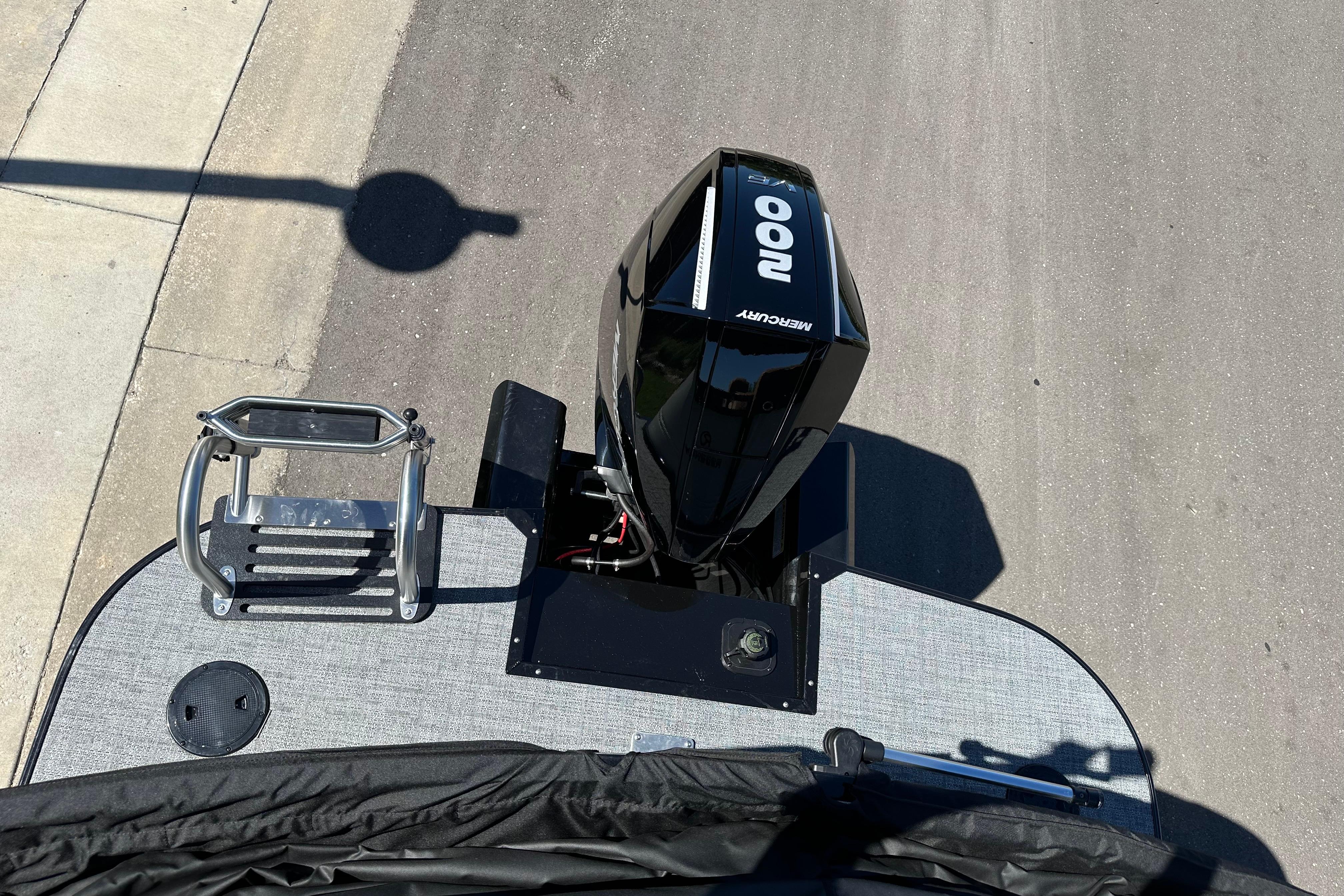 Top view of 2026 Regency 230 DL boat with Mercury 100 outboard motor.