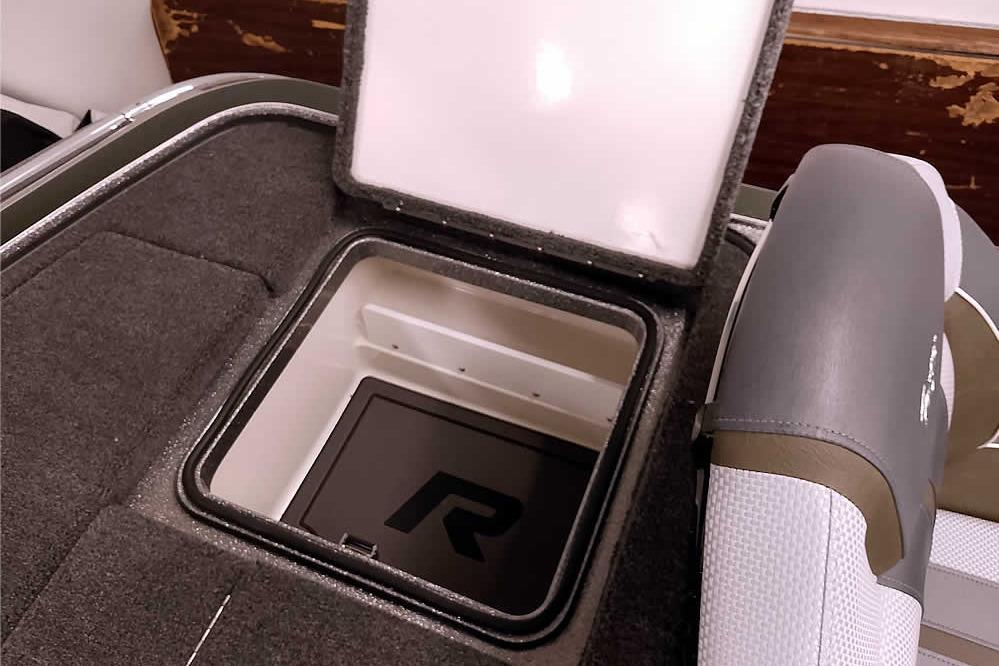 2026 Ranger Z519R Cup-Equipped boat storage compartment with open lid.
