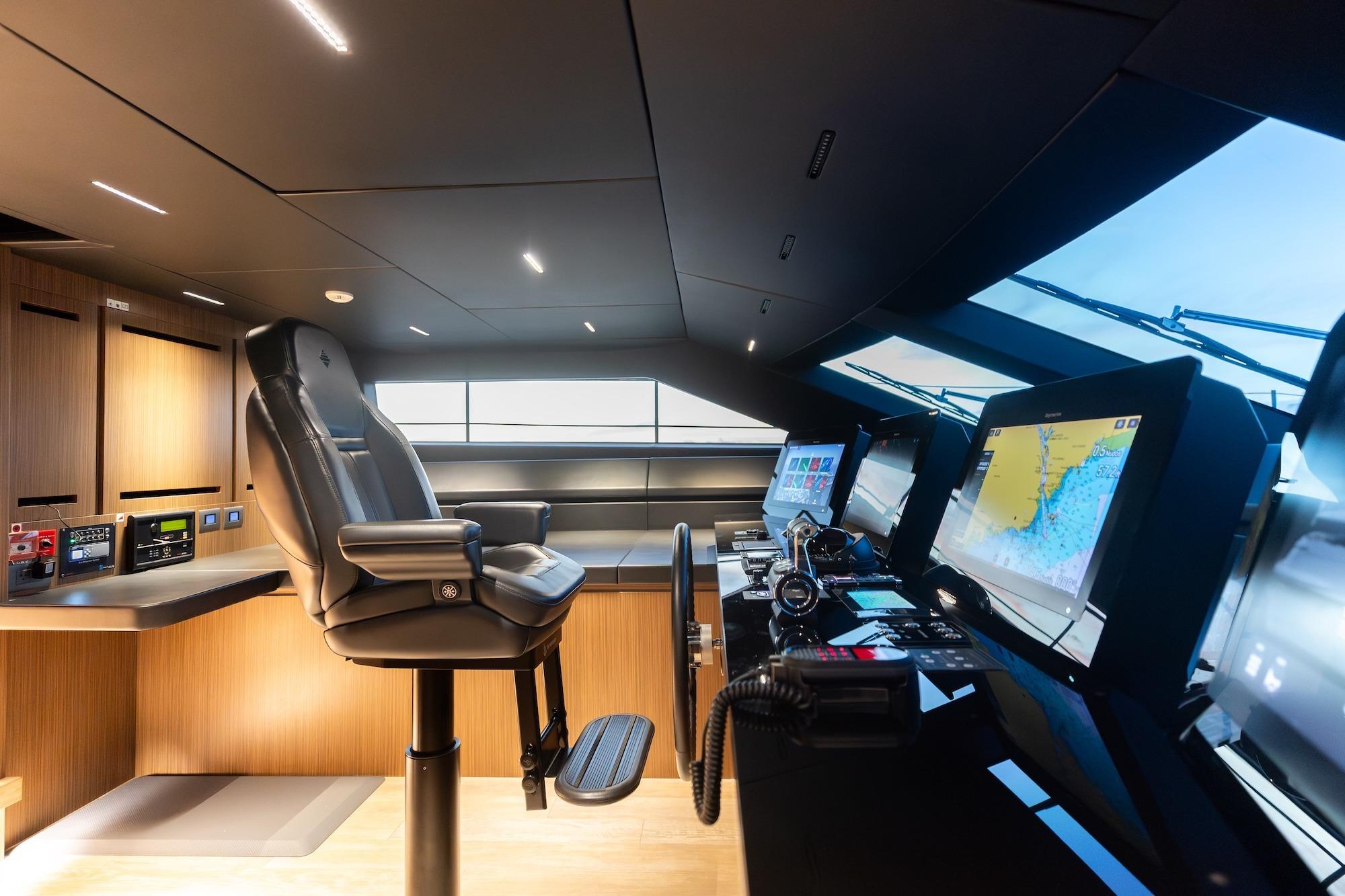 Modern helm station of 2020 Sanlorenzo SLA120A yacht with advanced navigation systems.