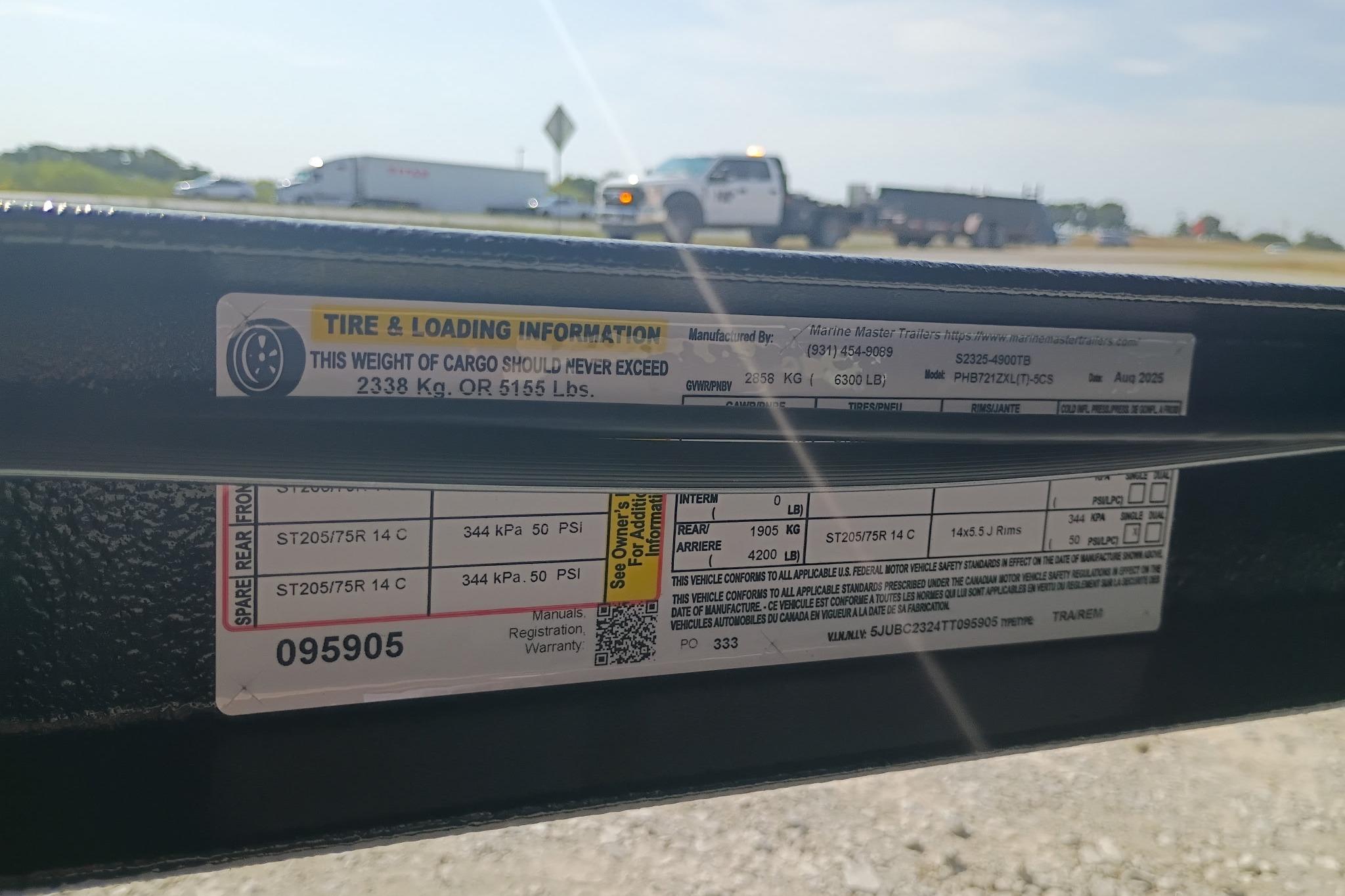 Tire and loading information label on a 2026 Phoenix 721 ZXL trailer.