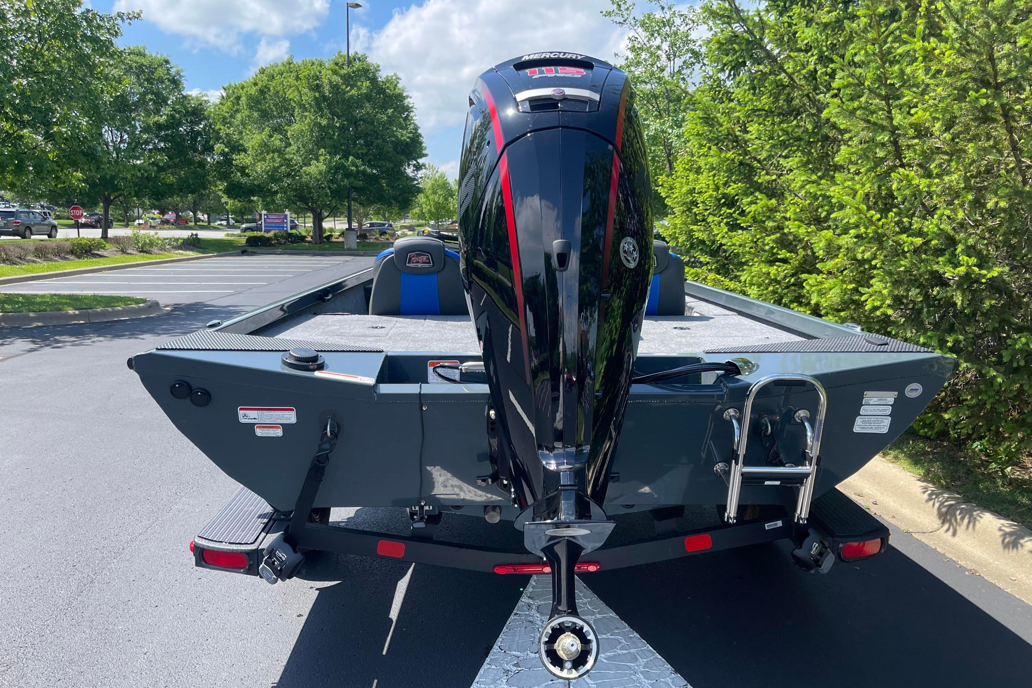 2026 Ranger RT188 boat with Mercury engine, parked outdoors on a sunny day.
