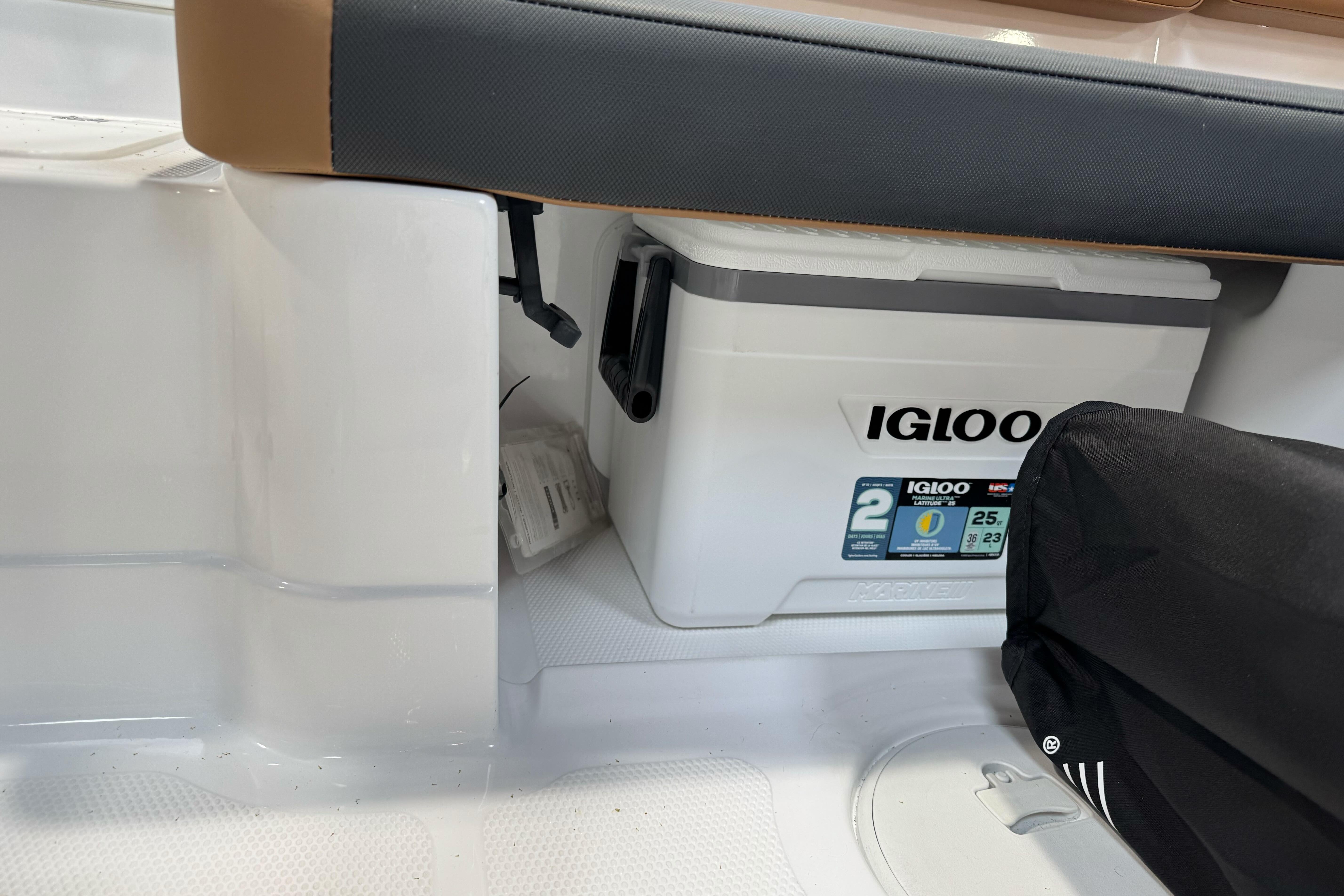Interior of 2026 Tahoe 2150 boat with Igloo cooler storage.