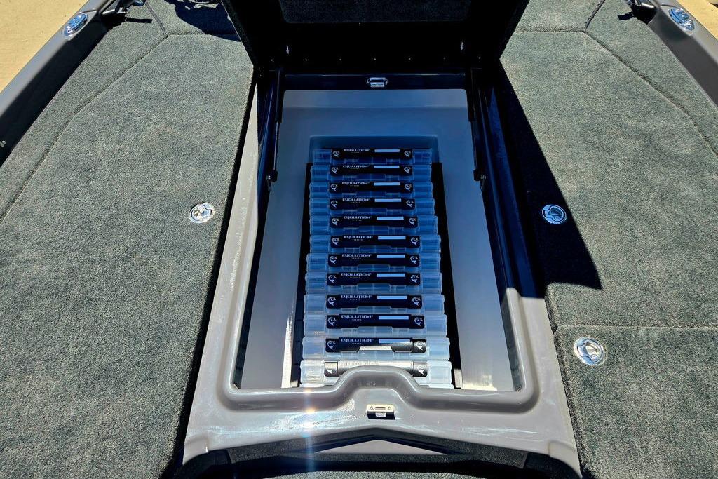 Storage compartment of 2026 Skeeter ZXE20 boat, showcasing organized battery setup.