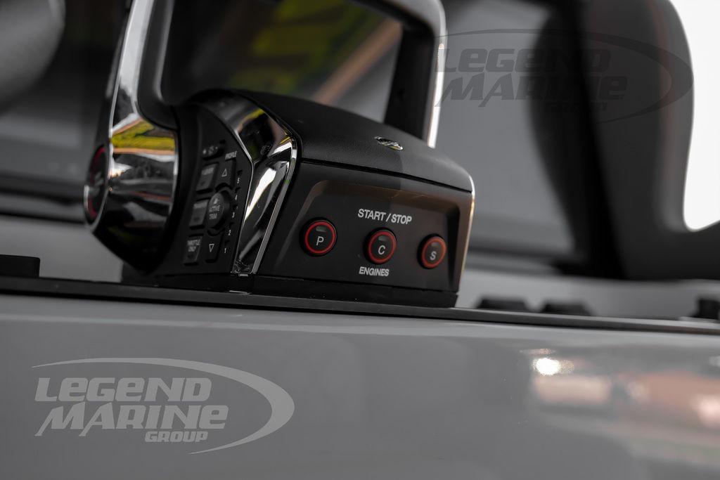 Control panel of 2024 Statement 350 Open boat with start/stop buttons, Legend Marine Group branding.