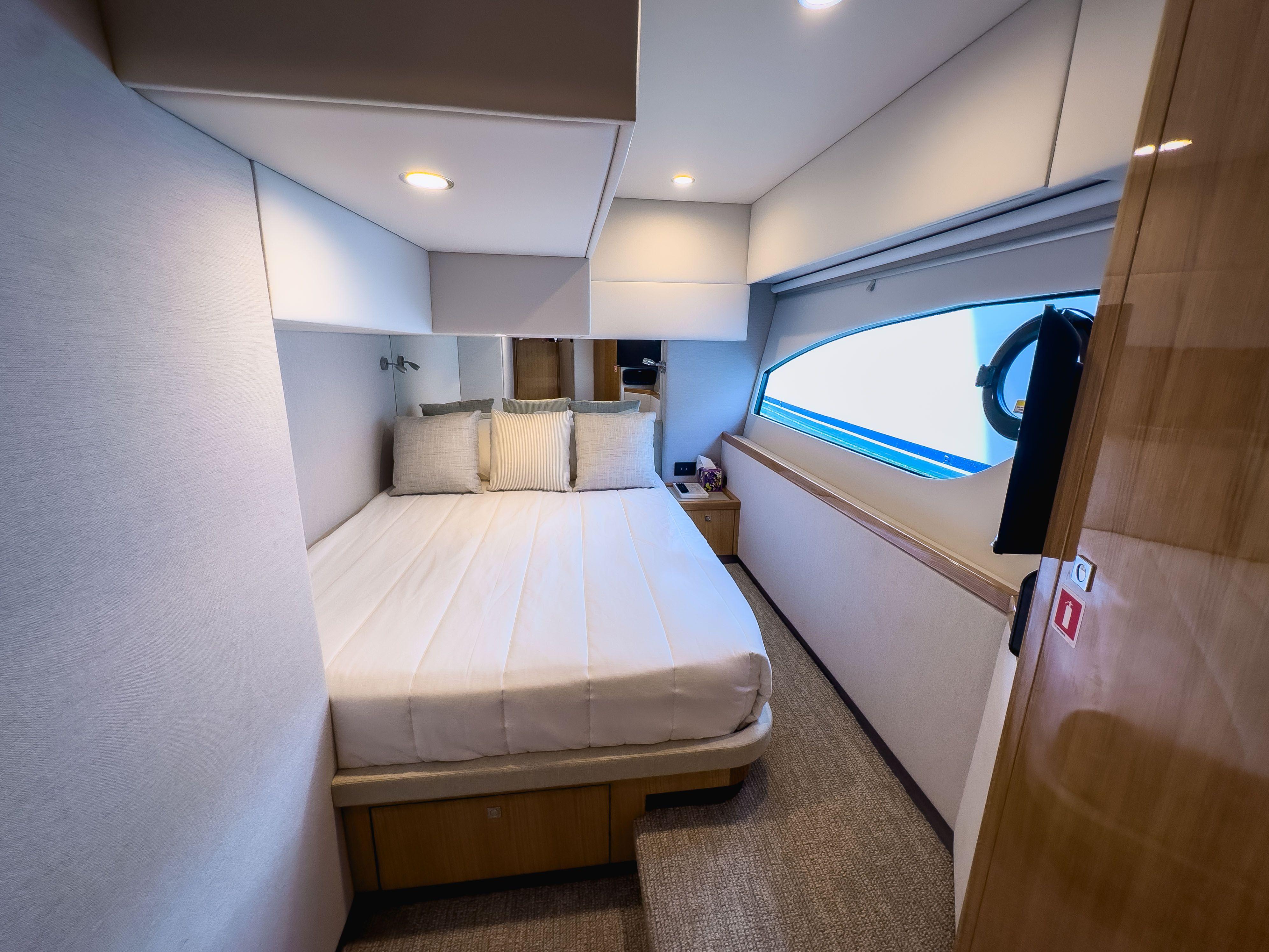 2024 Riviera SMY 46 yacht cabin with modern interior and large window.