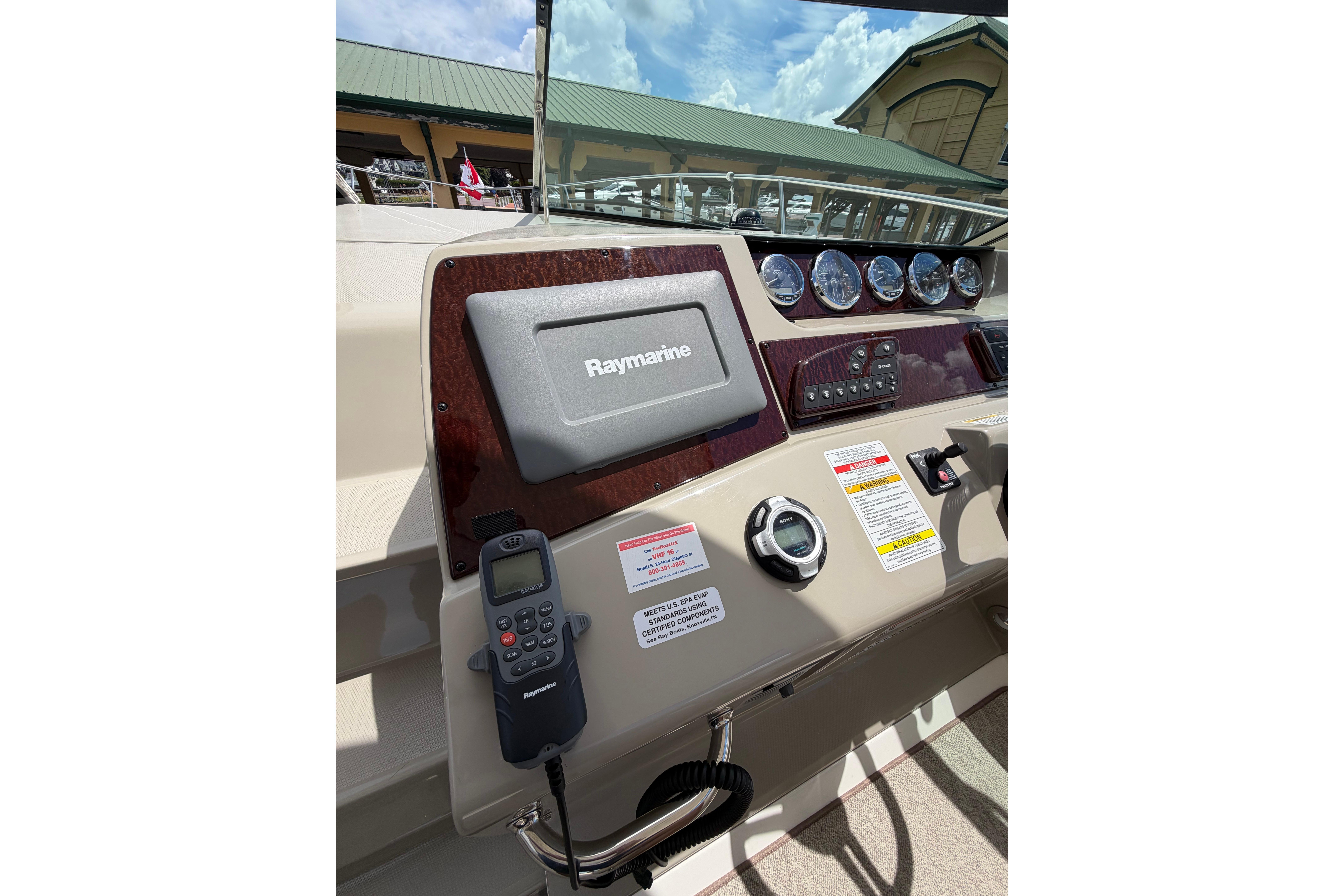 Control panel of 2012 Sea Ray Sundancer 370 with Raymarine navigation system.