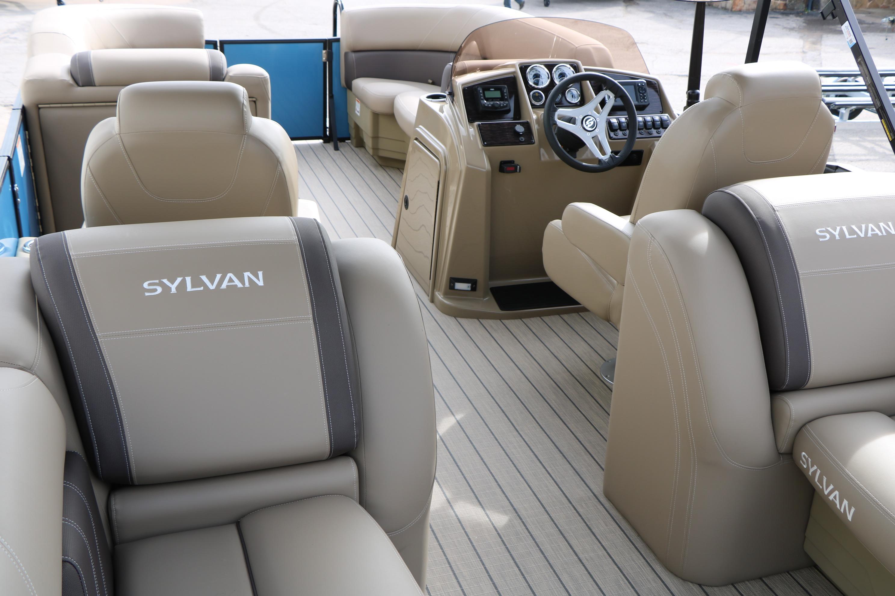 2026 Sylvan Mirage 822 LZ pontoon boat interior with luxurious seating and modern dashboard.